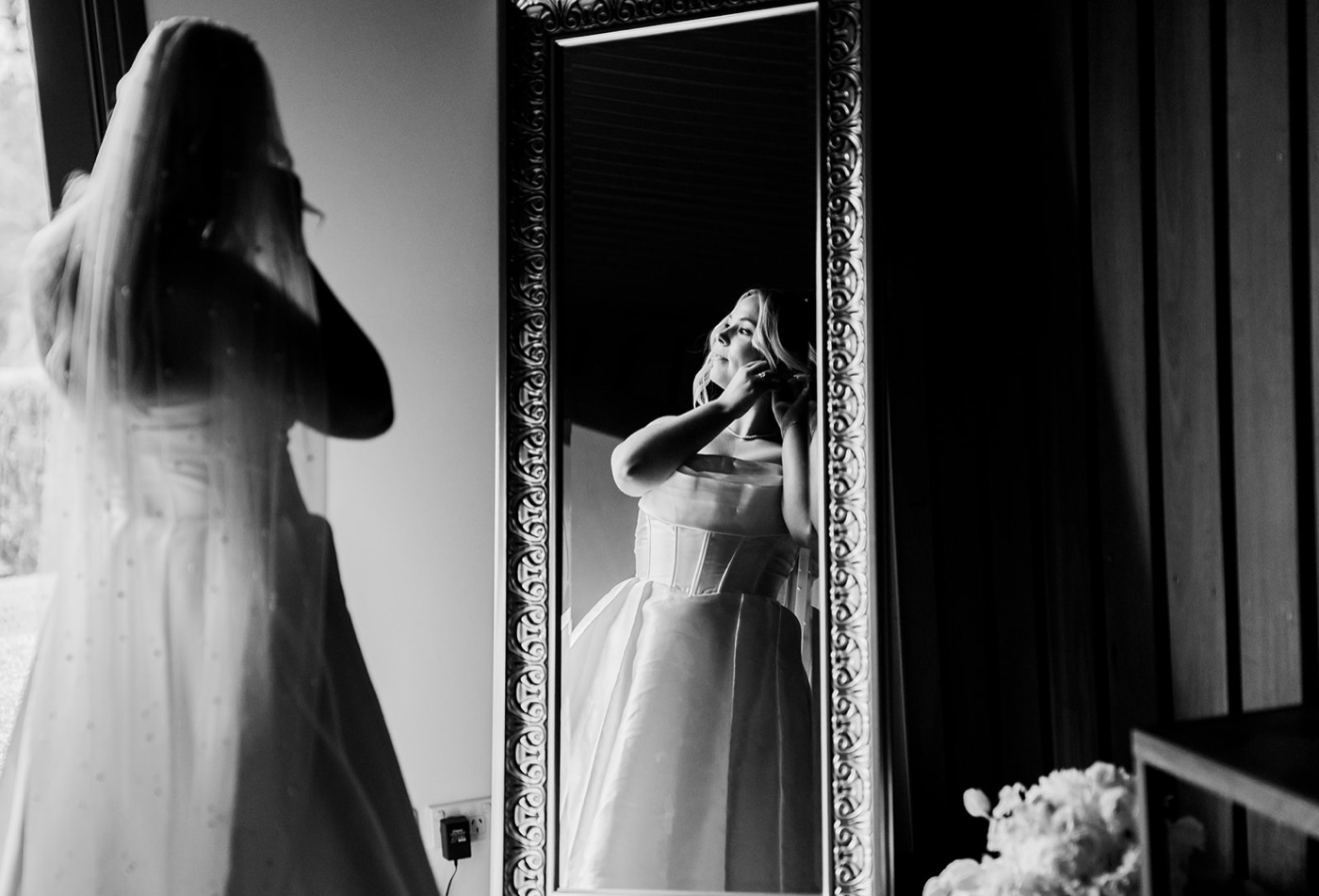 Getting ready by the window, in black and white. Ashley & Justin's wedding at Haven Ridge, Grants Beach, Mid North Coast