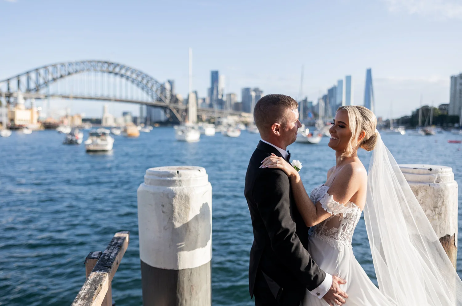 The couple on the harbour with the Sydney Harbour Bridge behind