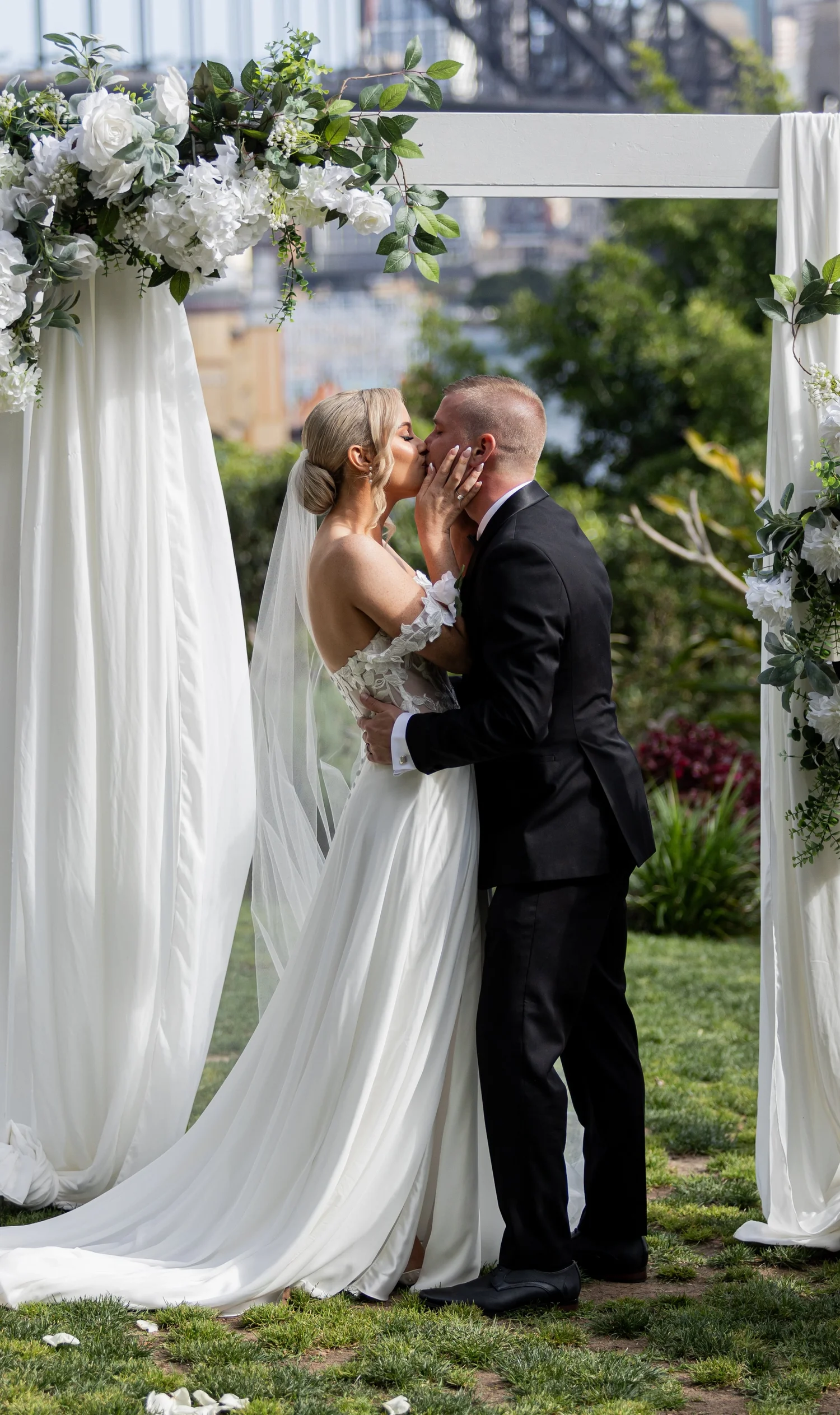 The couple under a floral arbour