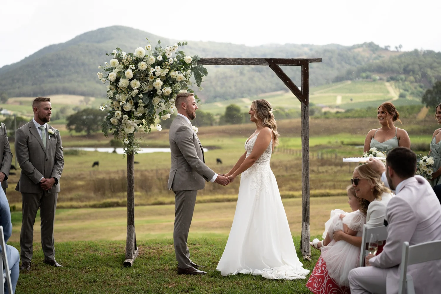 A country ceremony with the mountains behind