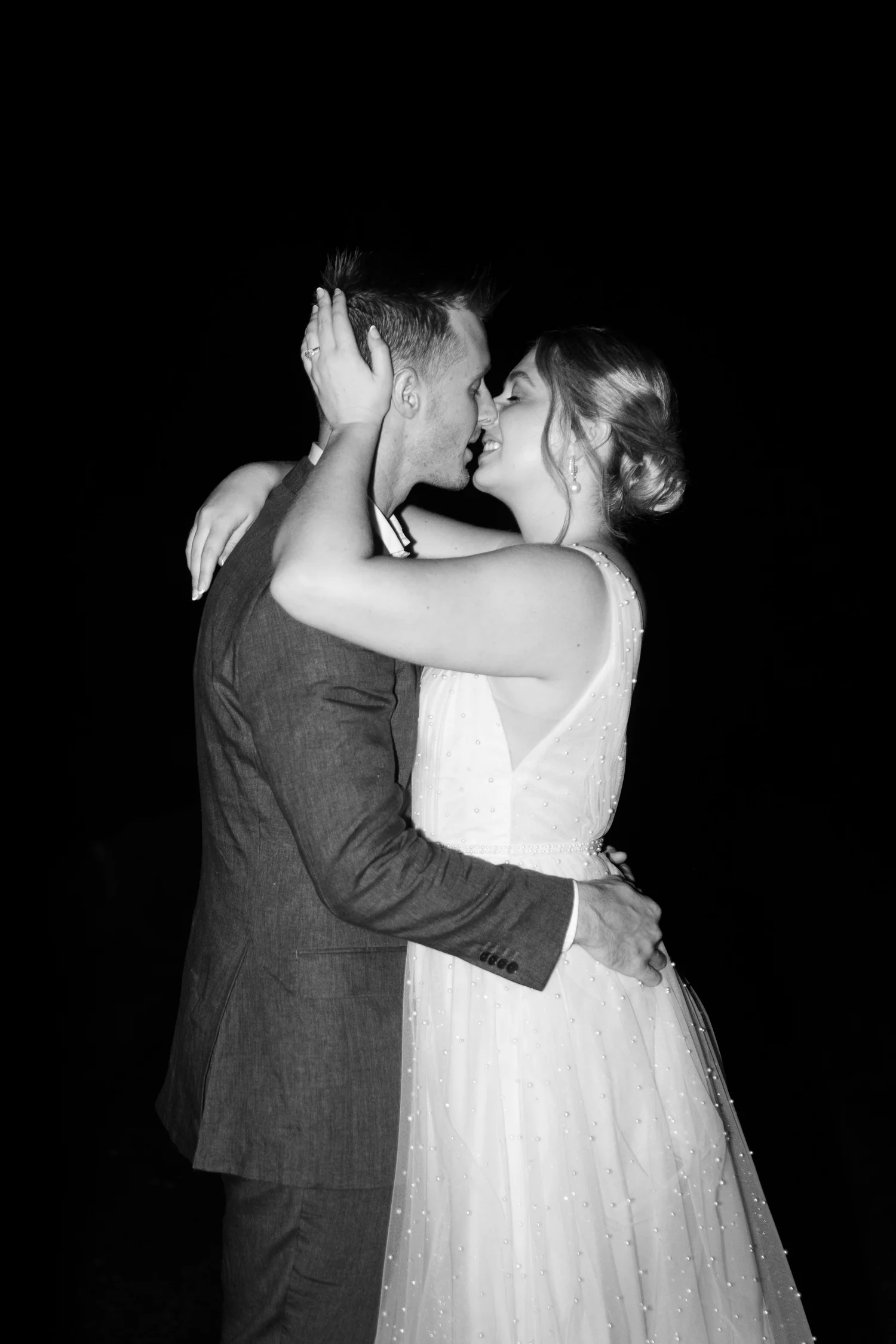 A kiss, in black and white
