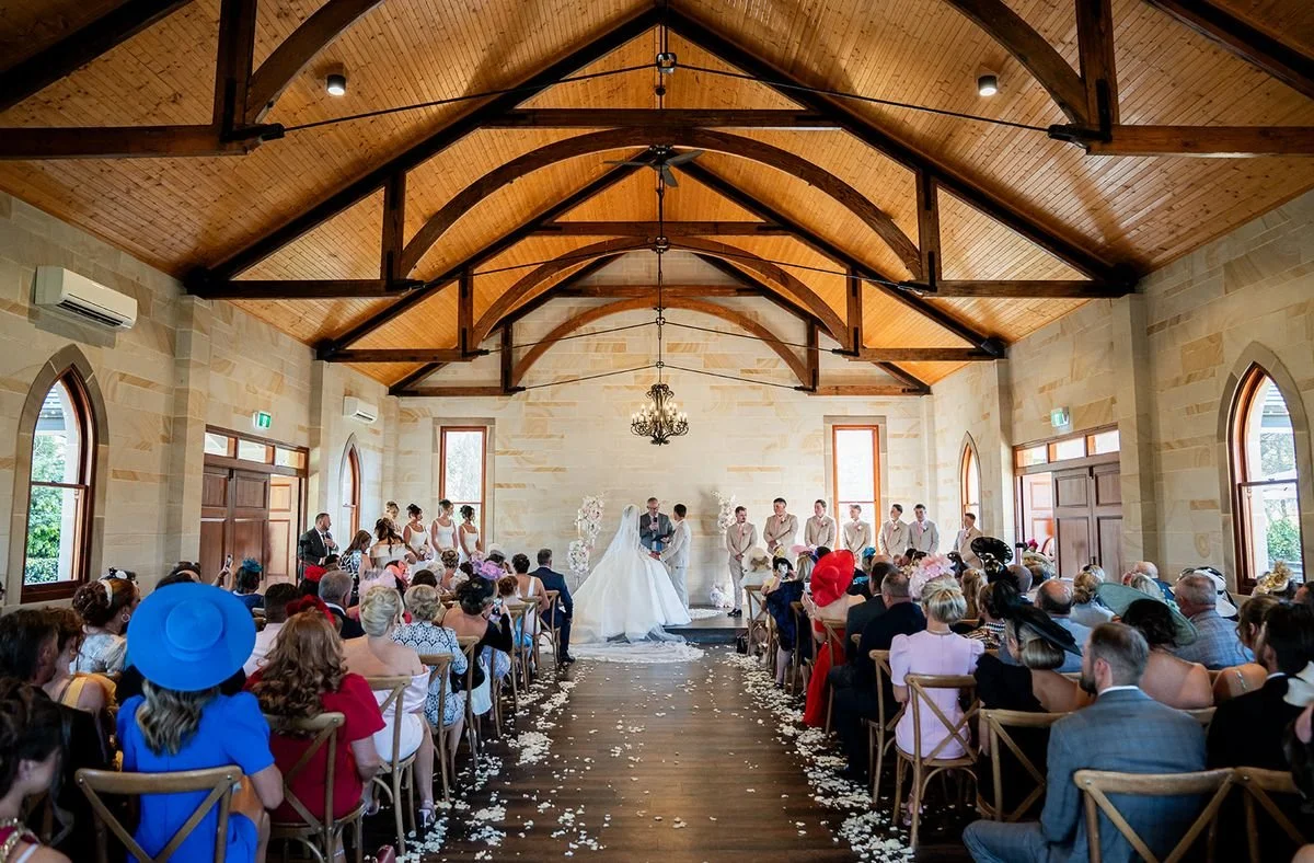 Guests in the chapel during the ceremony. Wedding at Peterson House, Hunter Valley