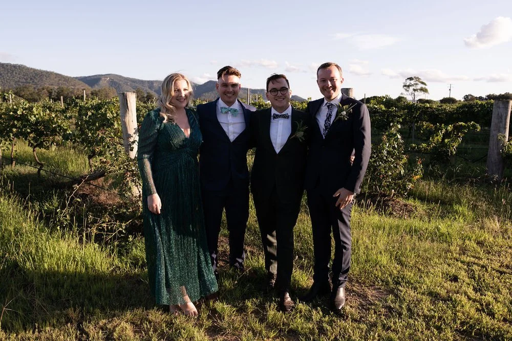 The wedding party in the vineyard. Aaron & Scott's wedding at Margan Wines, Hunter Valley