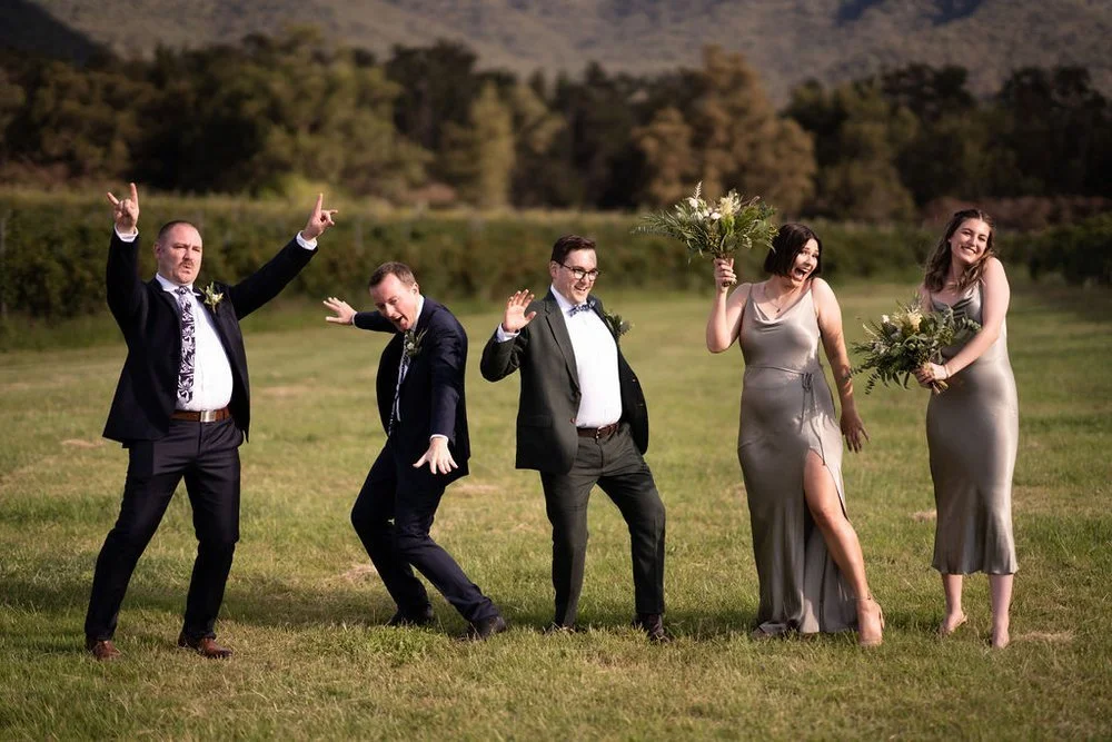 The wedding party dancing on the lawn. Aaron & Scott's wedding at Margan Wines, Hunter Valley