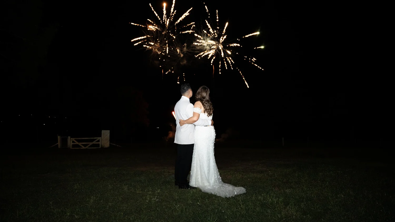 Fireworks over the couple at night. Abbey & Tyran's wedding at Hunter Valley Gardens & Kirkton Park, Hunter Valley