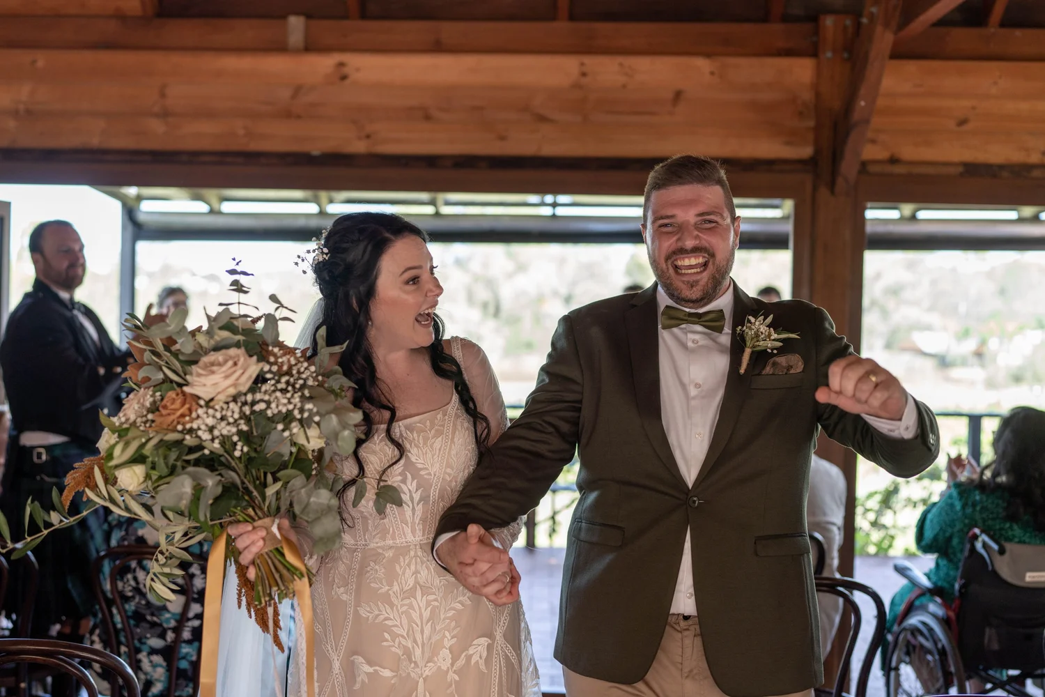 Just married, cheering on the verandah. Alana & Peter's wedding at Peppers Creek, Hunter Valley