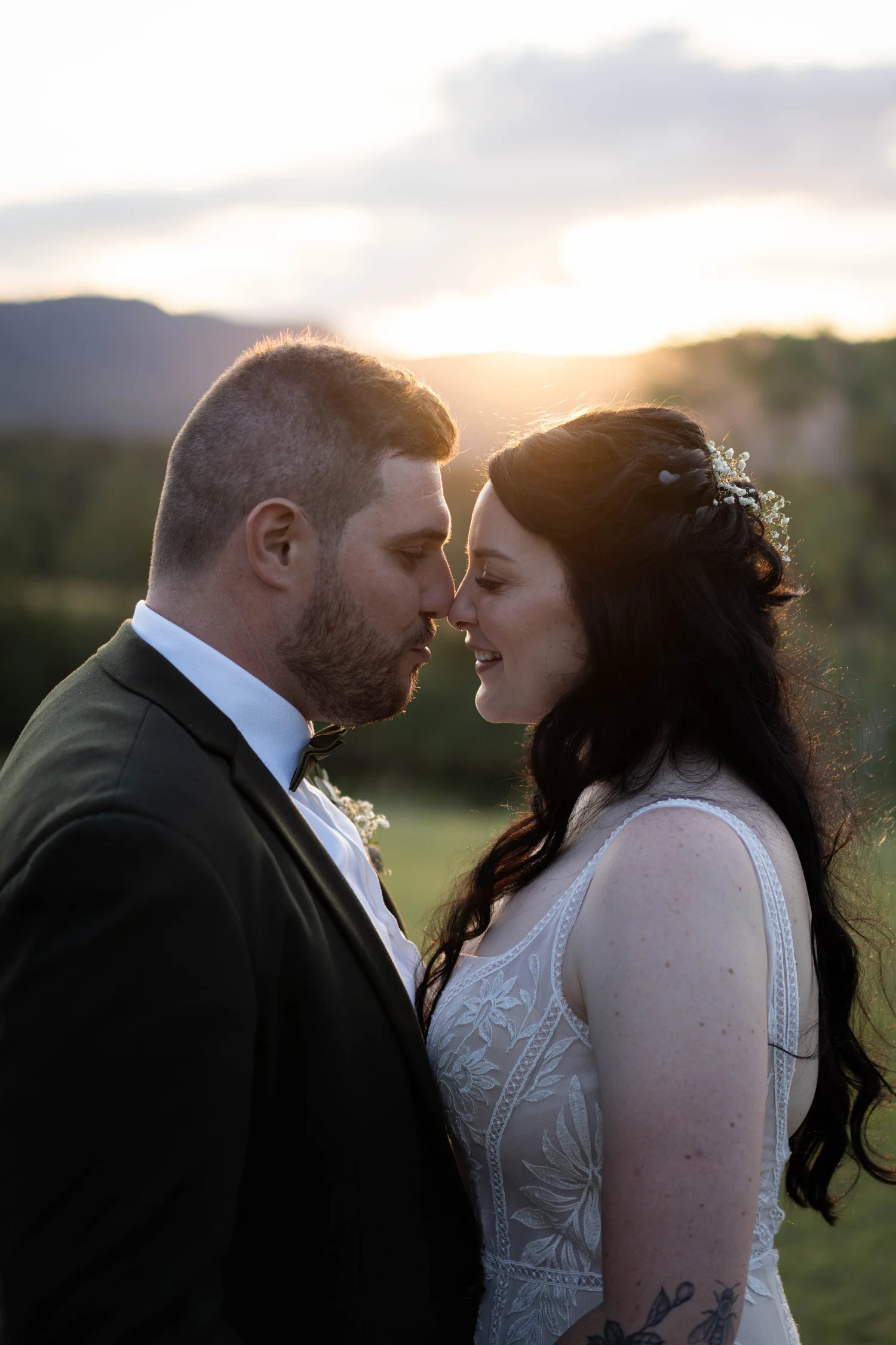 A kiss at sunset. Alana & Peter's wedding at Peppers Creek, Hunter Valley