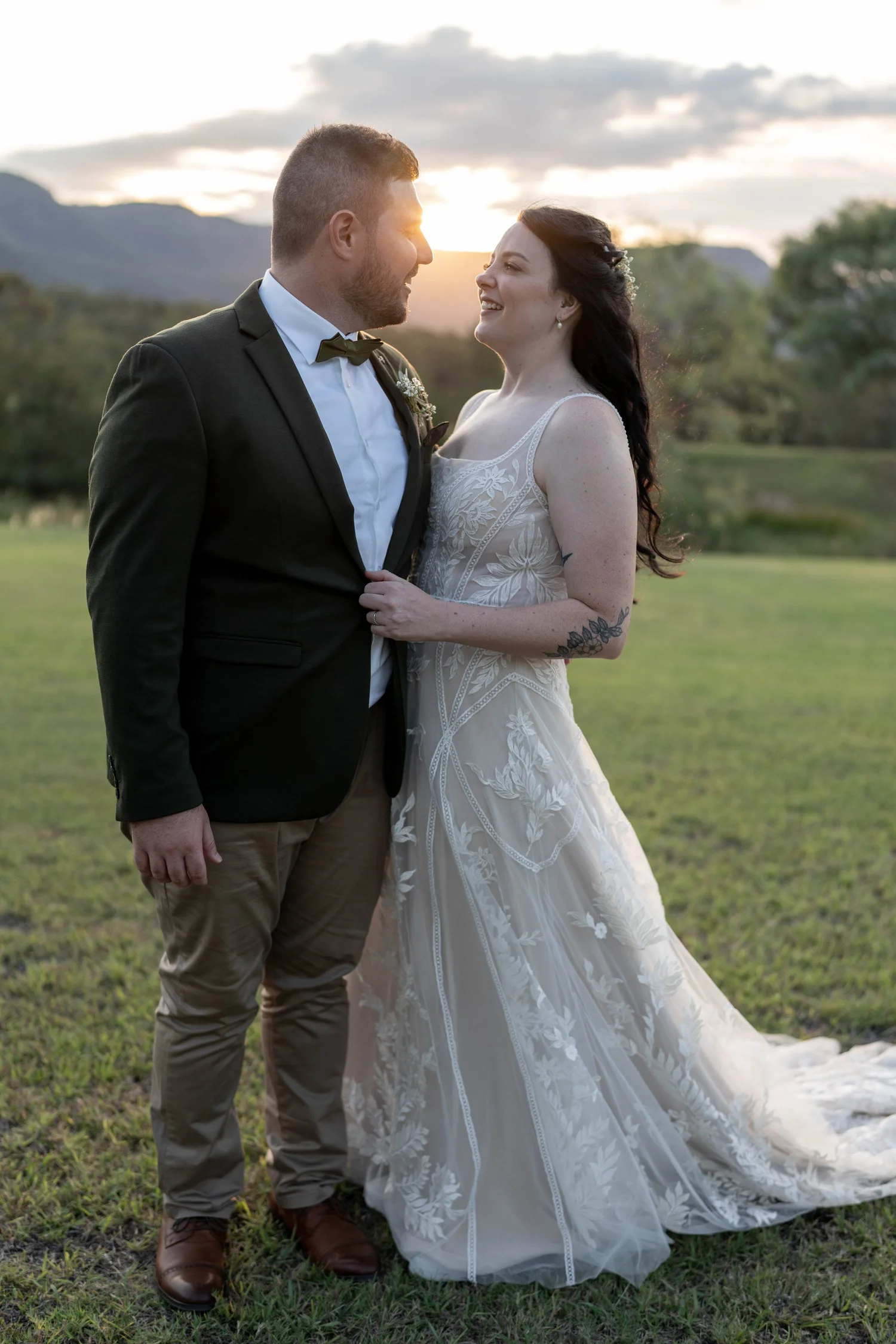 The couple on the lawn at golden hour. Alana & Peter's wedding at Peppers Creek, Hunter Valley