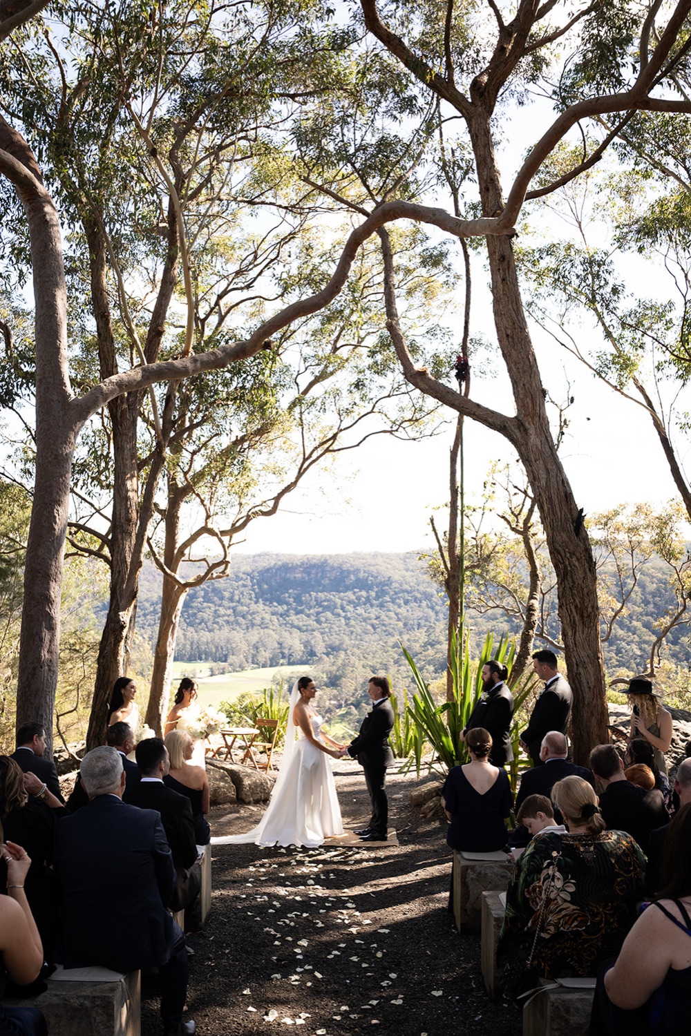 The ceremony among the gum trees above the valley. Amelia & Connor's wedding at Glenworth Valley, Central Coast