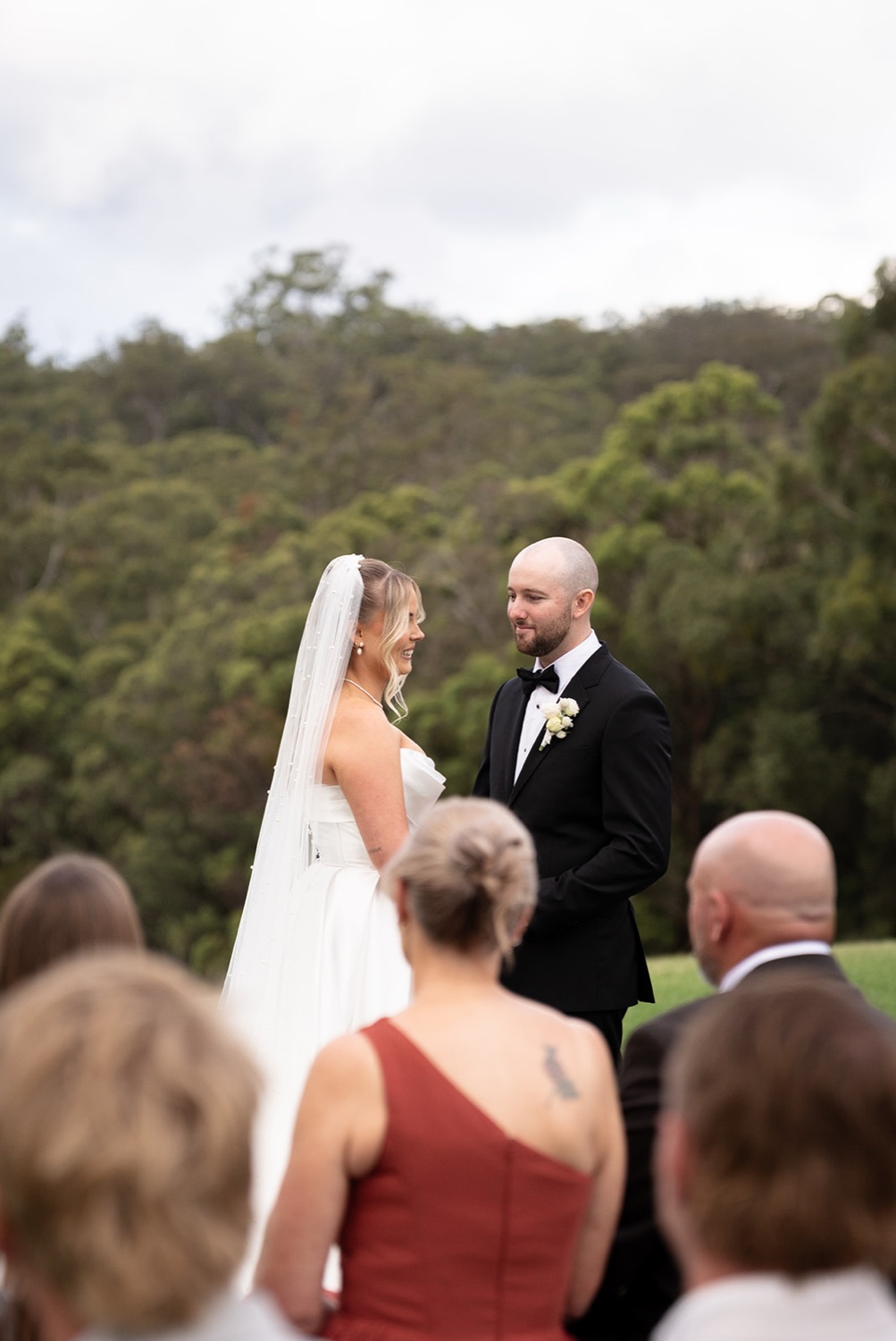 The ceremony seen from the guests. Ashley & Justin's wedding at Haven Ridge, Grants Beach, Mid North Coast