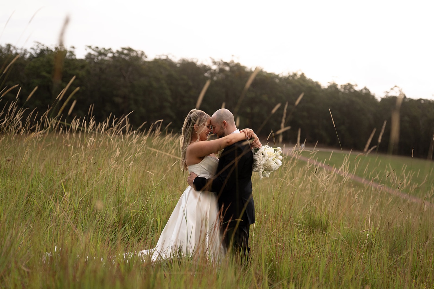 Dancing in the long grass. Ashley & Justin's wedding at Haven Ridge, Grants Beach, Mid North Coast