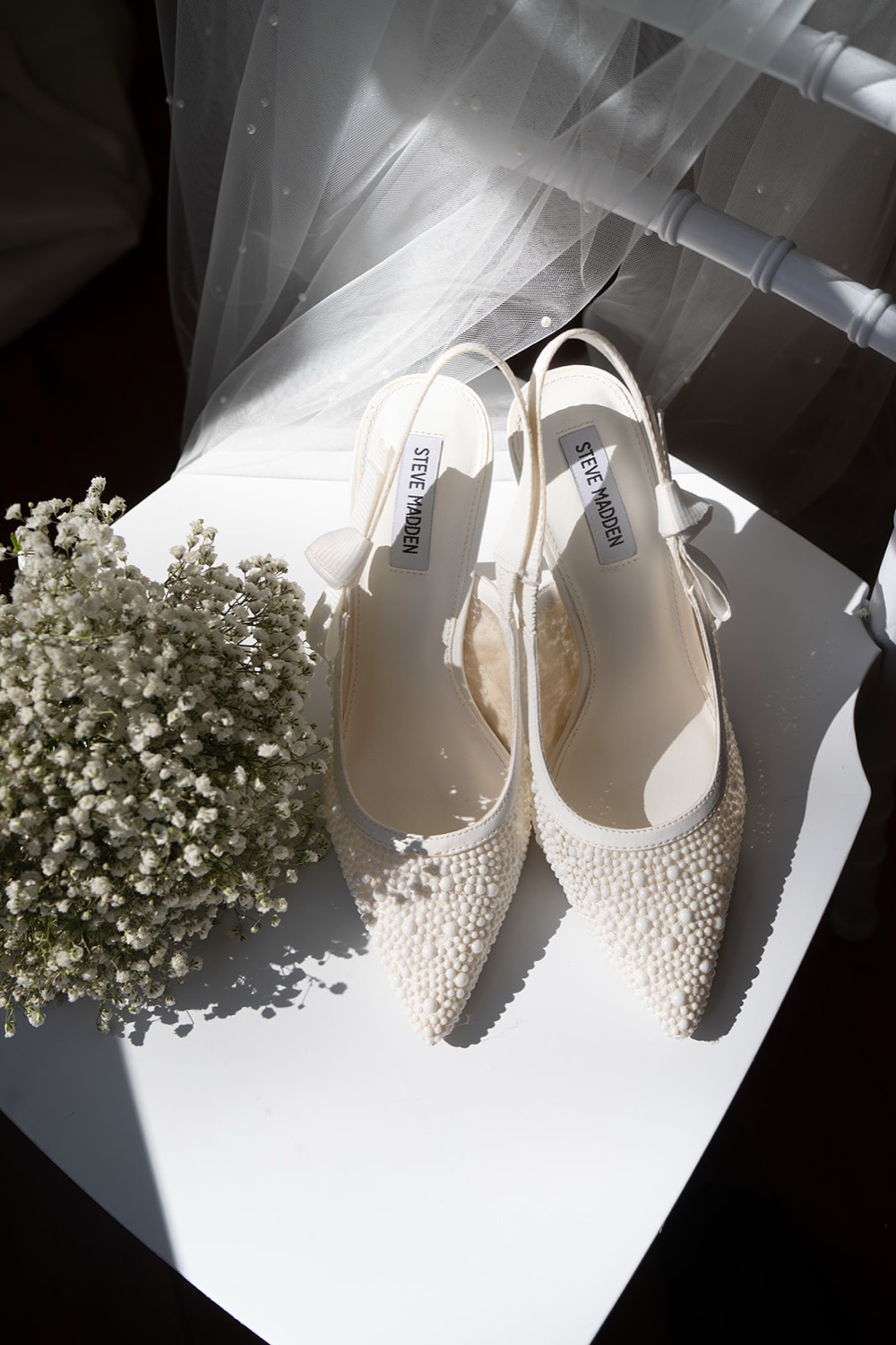 Wedding shoes and flowers. Charlie & Lachlan's wedding at Kantara House, Central Coast