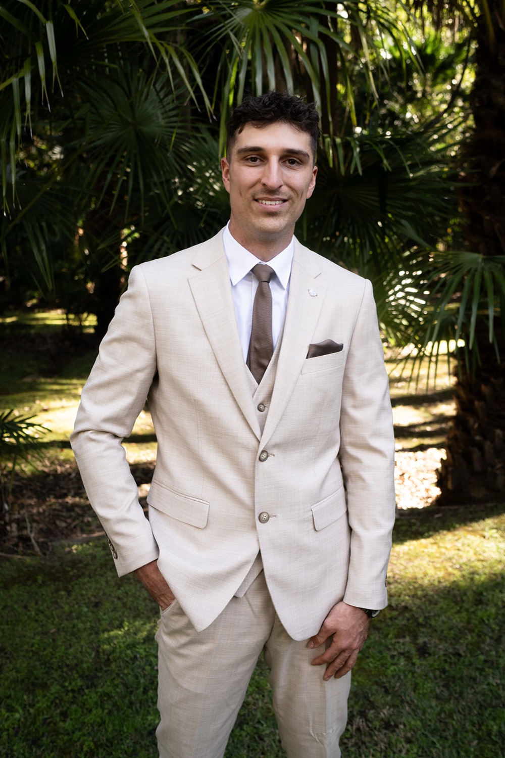 Ready in a cream suit in the garden. Charlie & Lachlan's wedding at Kantara House, Central Coast