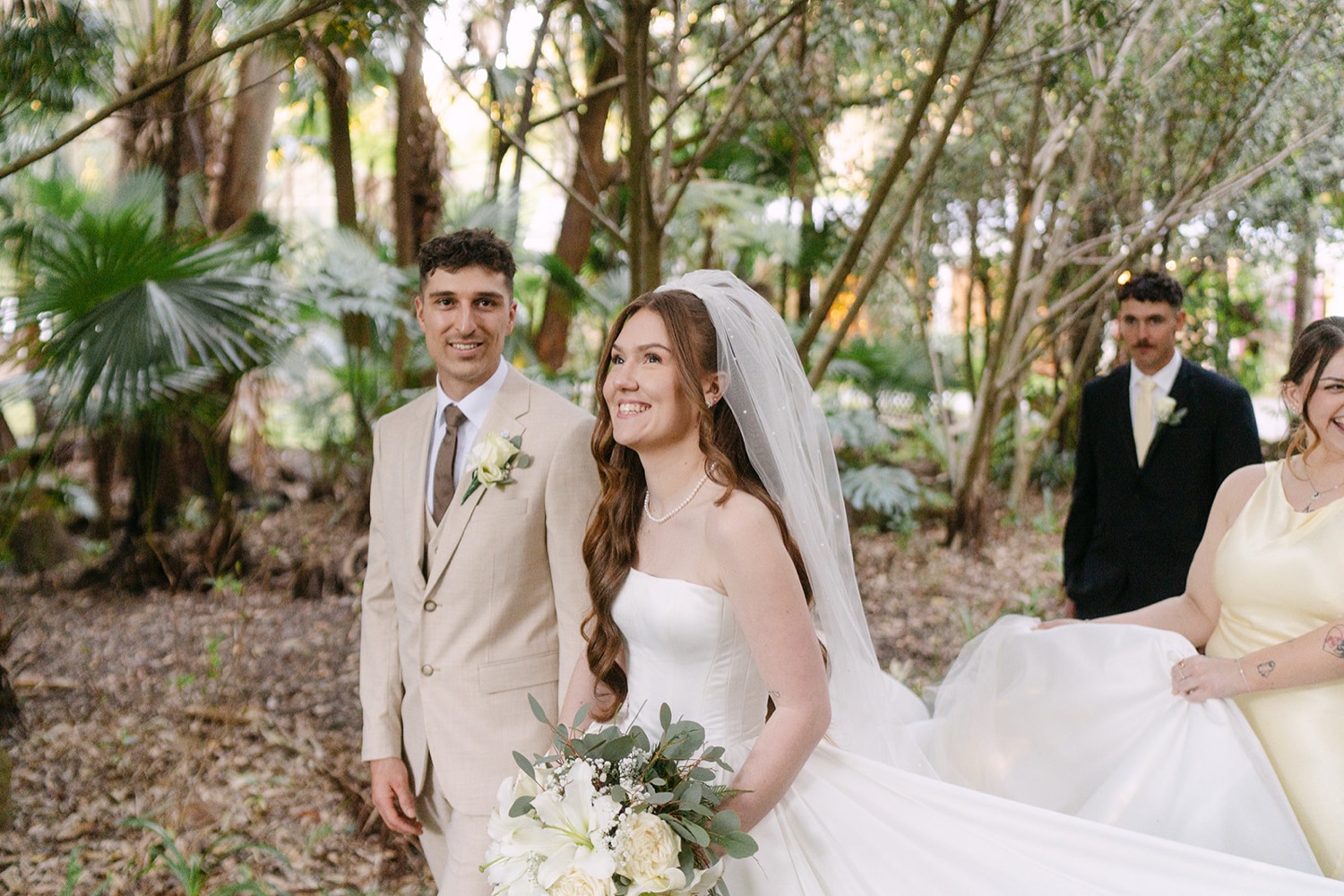 Laughing in the garden. Charlie & Lachlan's wedding at Kantara House, Central Coast
