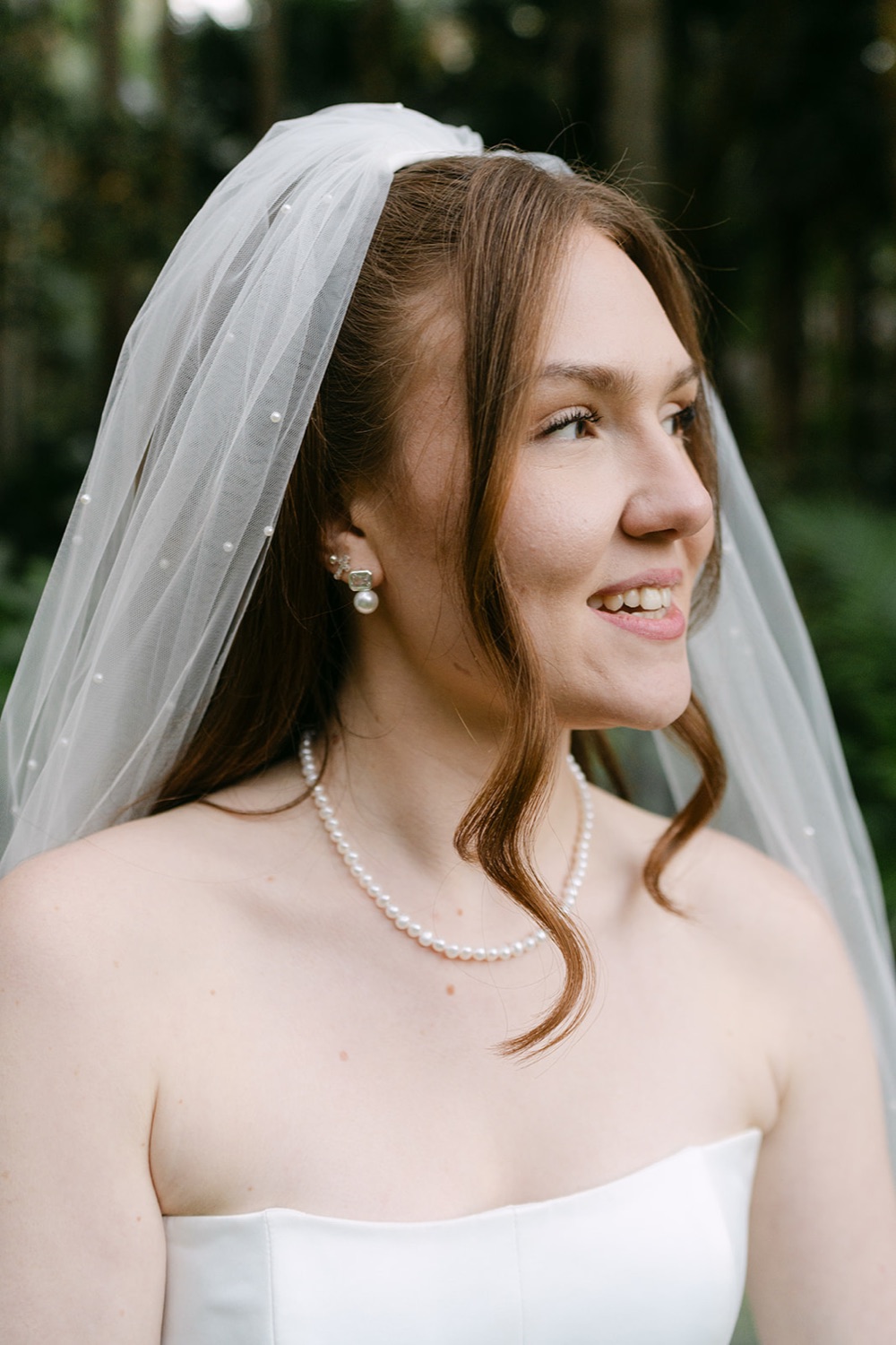 A close portrait under the veil. Charlie & Lachlan's wedding at Kantara House, Central Coast