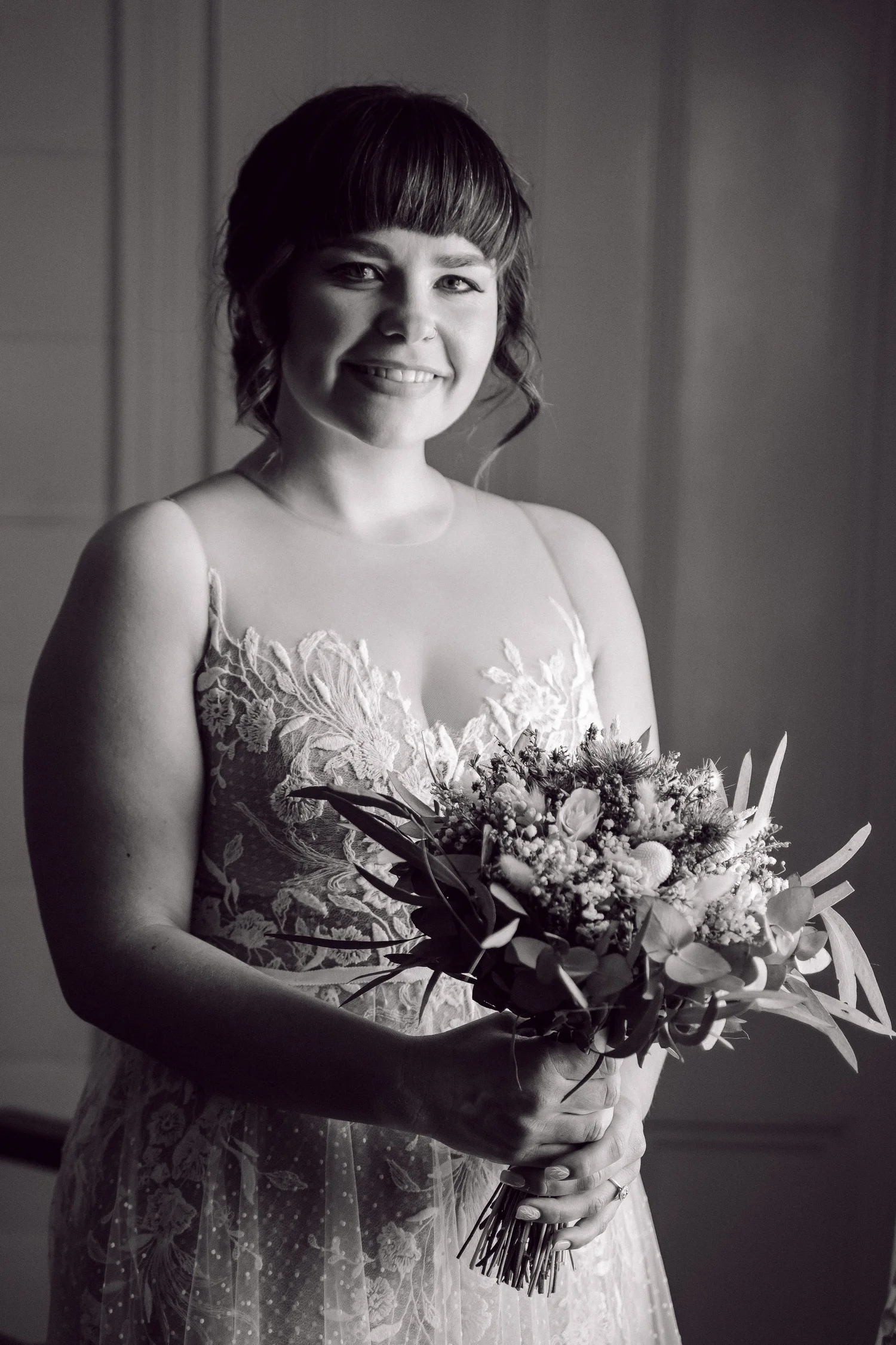 Portrait with the bouquet, in black and white. Daena & Inez's wedding at Collits Inn, Blue Mountains