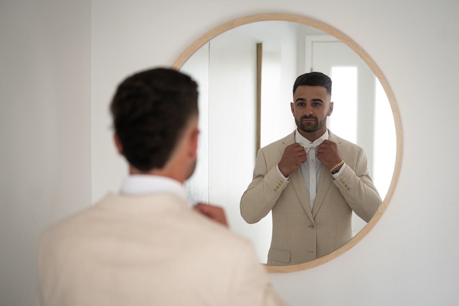 Getting ready at the mirror. Georgia & Kyle's wedding at Manly Pavilion, Sydney