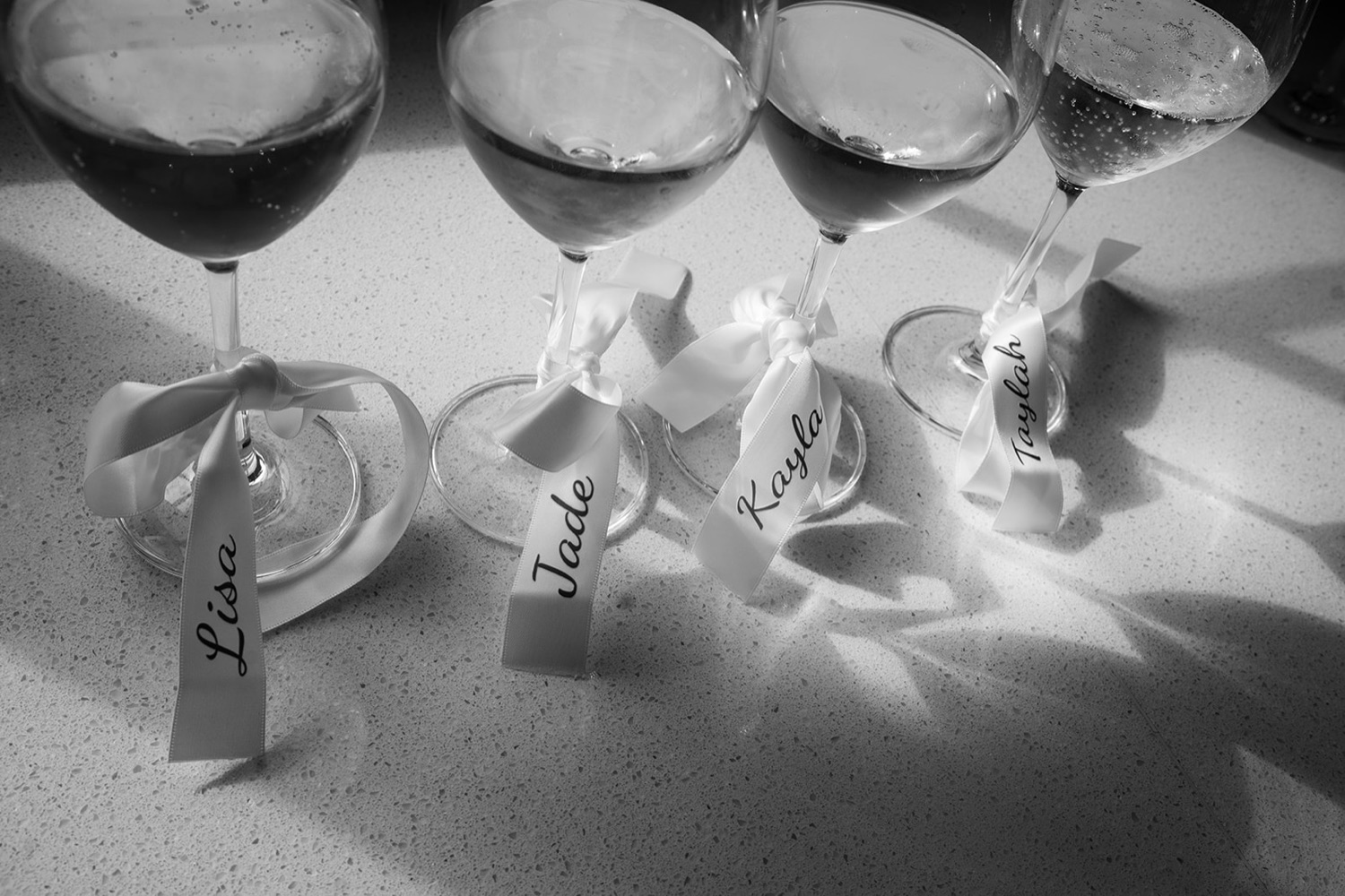 Champagne glasses, in black and white. Georgia & Kyle's wedding at Manly Pavilion, Sydney
