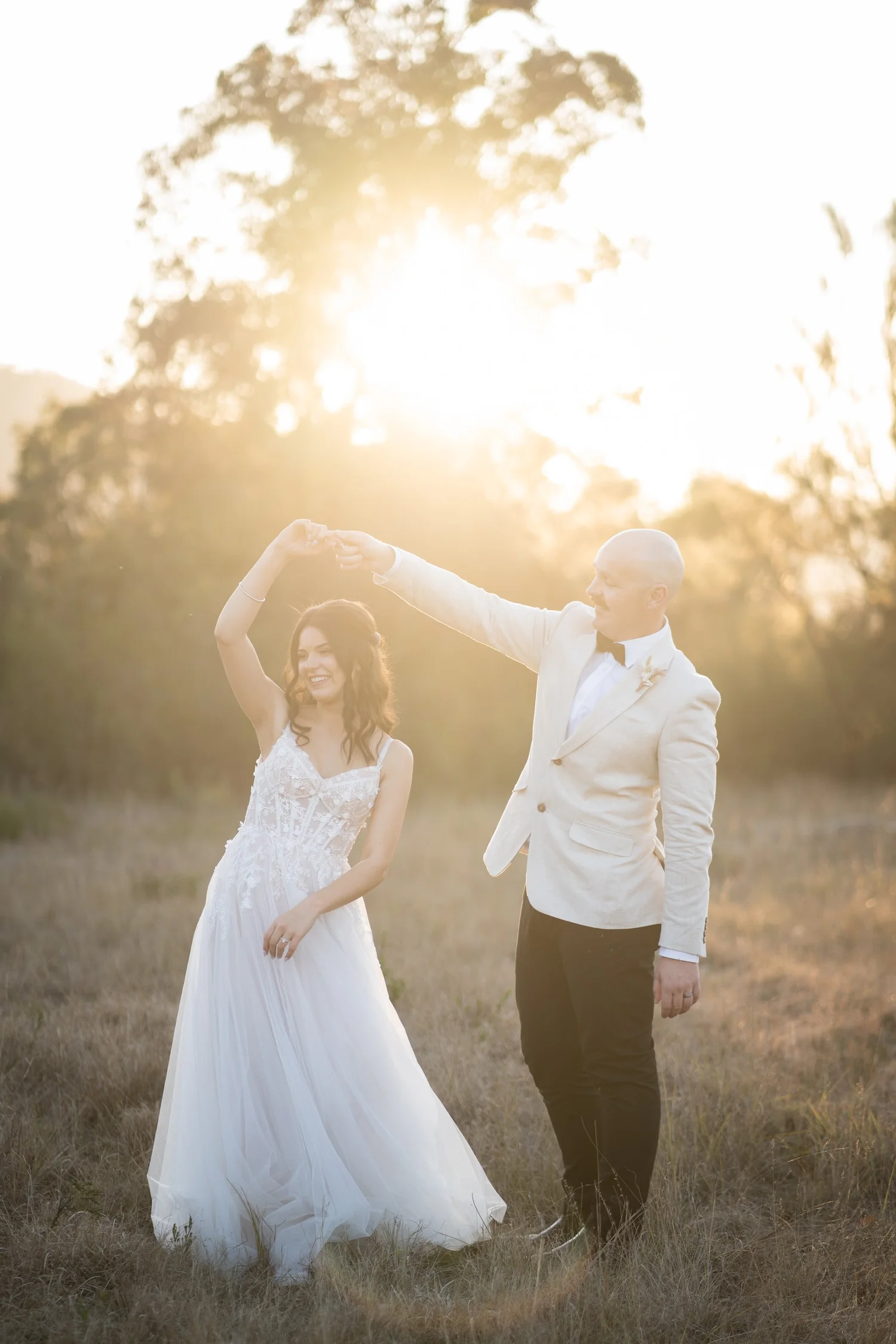 A twirl in the late afternoon sun. Grace & Rhys's wedding at Marlu Station, Hunter Valley