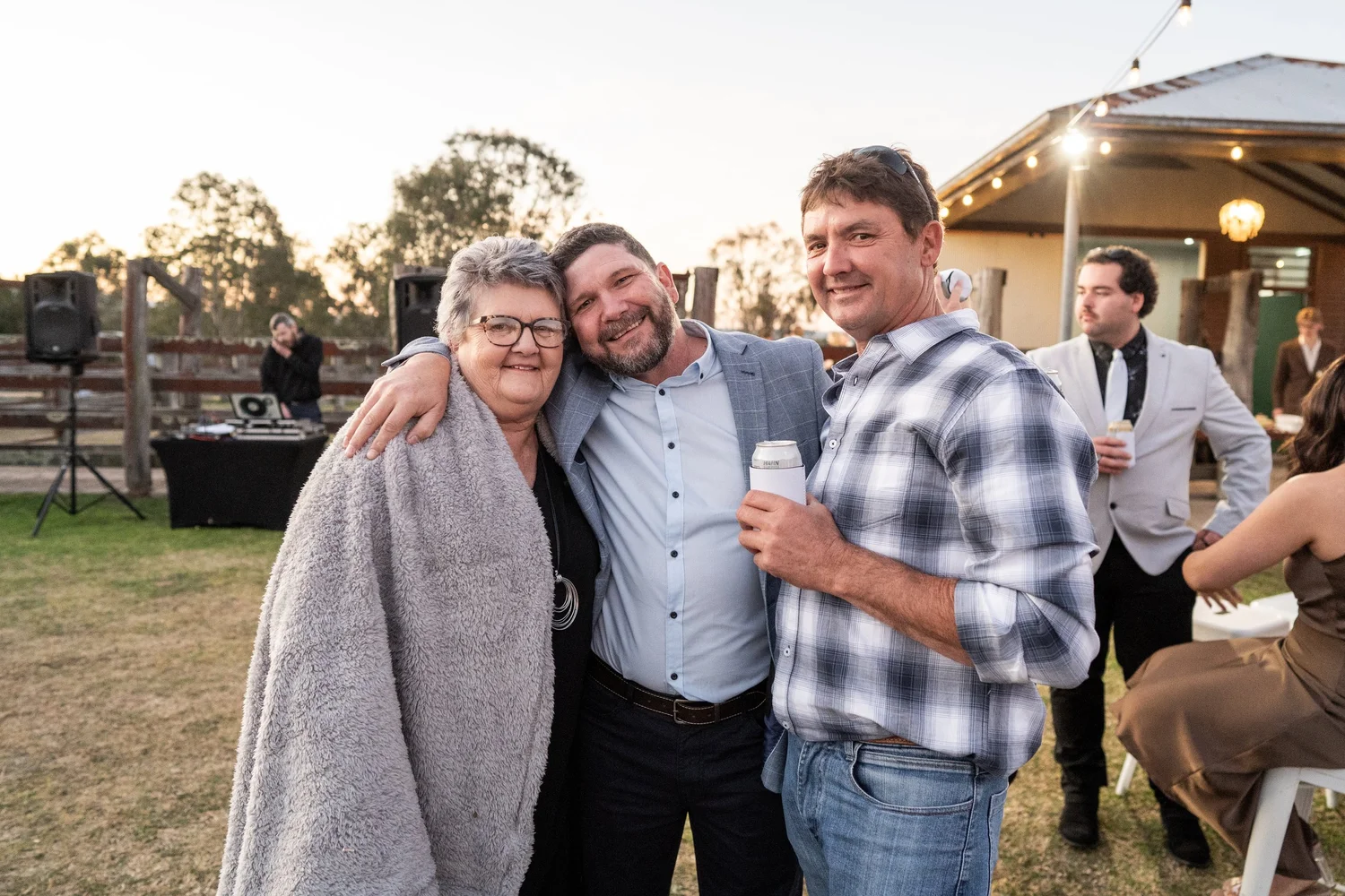 Guests laughing together. Grace & Rhys's wedding at Marlu Station, Hunter Valley