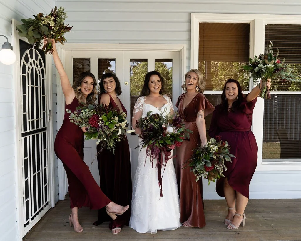 The wedding party on the verandah. Grace & Shannon's wedding at All Saints Chapel, Woodville, Hunter Valley
