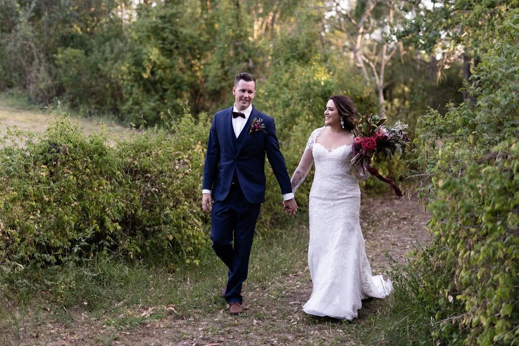 Walking through the garden. Grace & Shannon's wedding at All Saints Chapel, Woodville, Hunter Valley