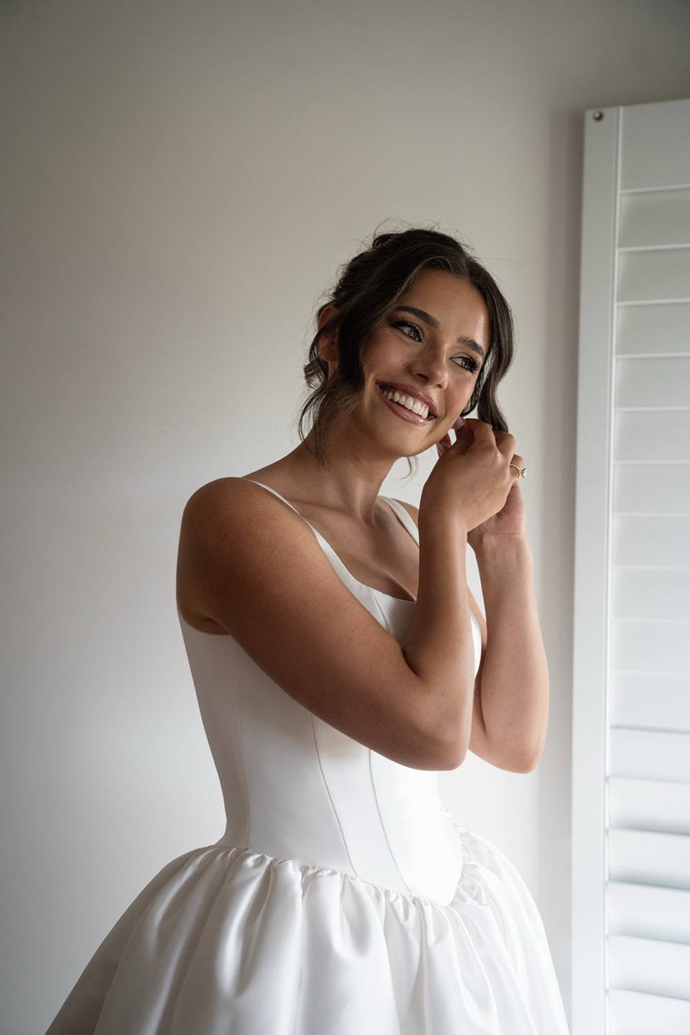 Smiling while getting ready. Jasmine & Joshua's wedding at The Lakehouse, North Richmond, Sydney
