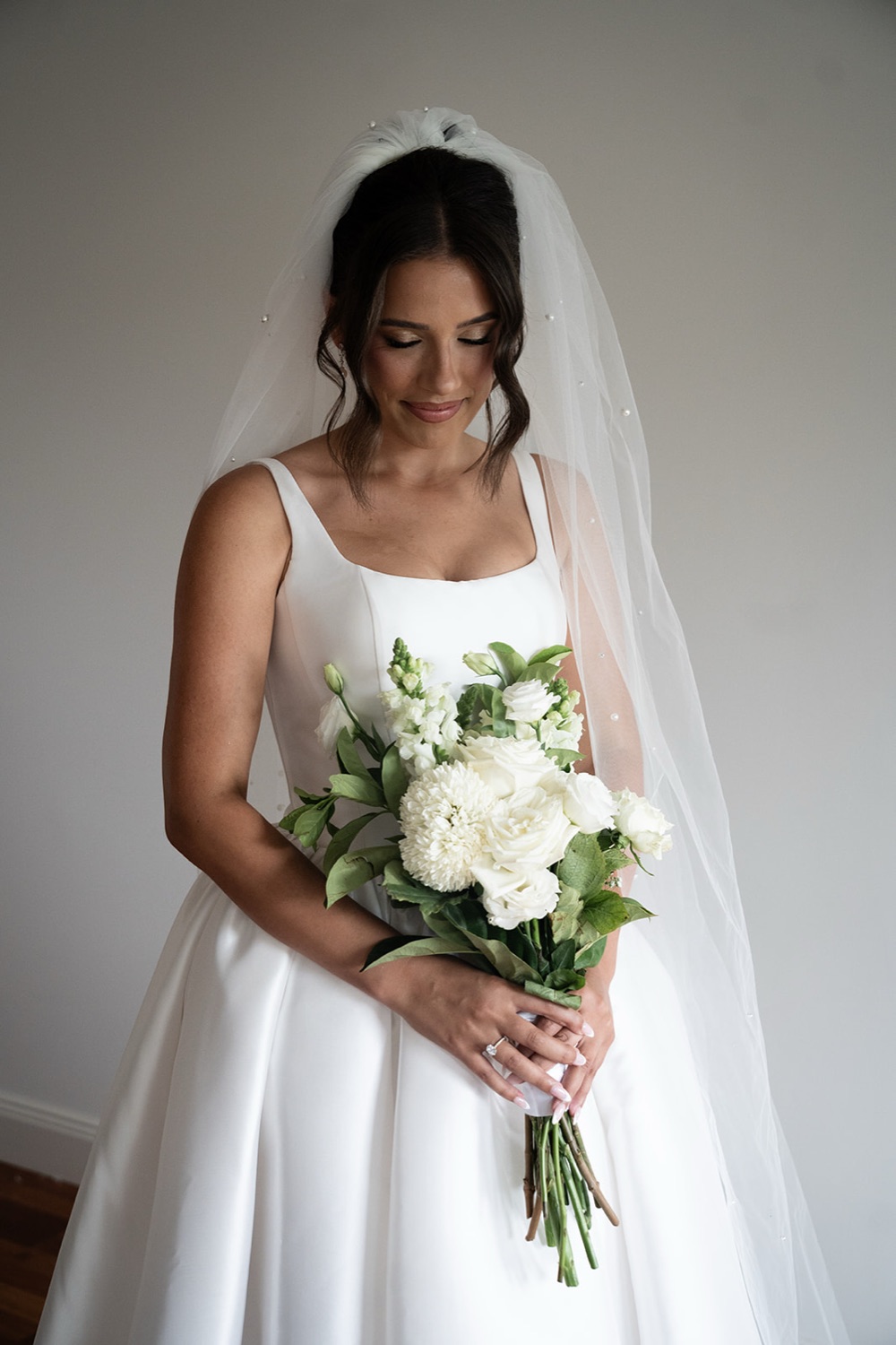 Portrait with the veil and bouquet. Jasmine & Joshua's wedding at The Lakehouse, North Richmond, Sydney