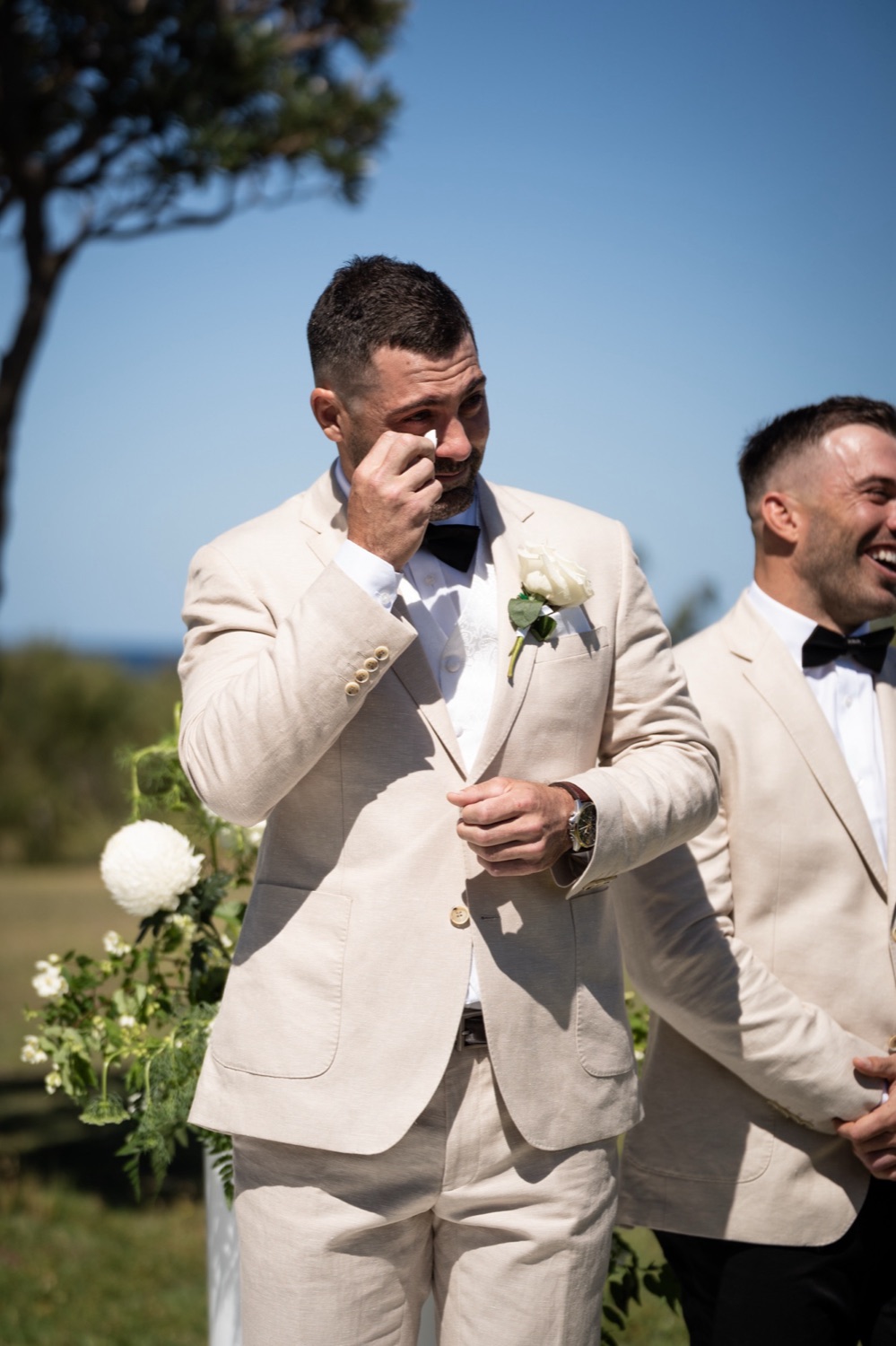 An emotional wait at the ceremony. Jemma & Matthew's wedding at Caves Coastal Bar & Bungalows, Newcastle