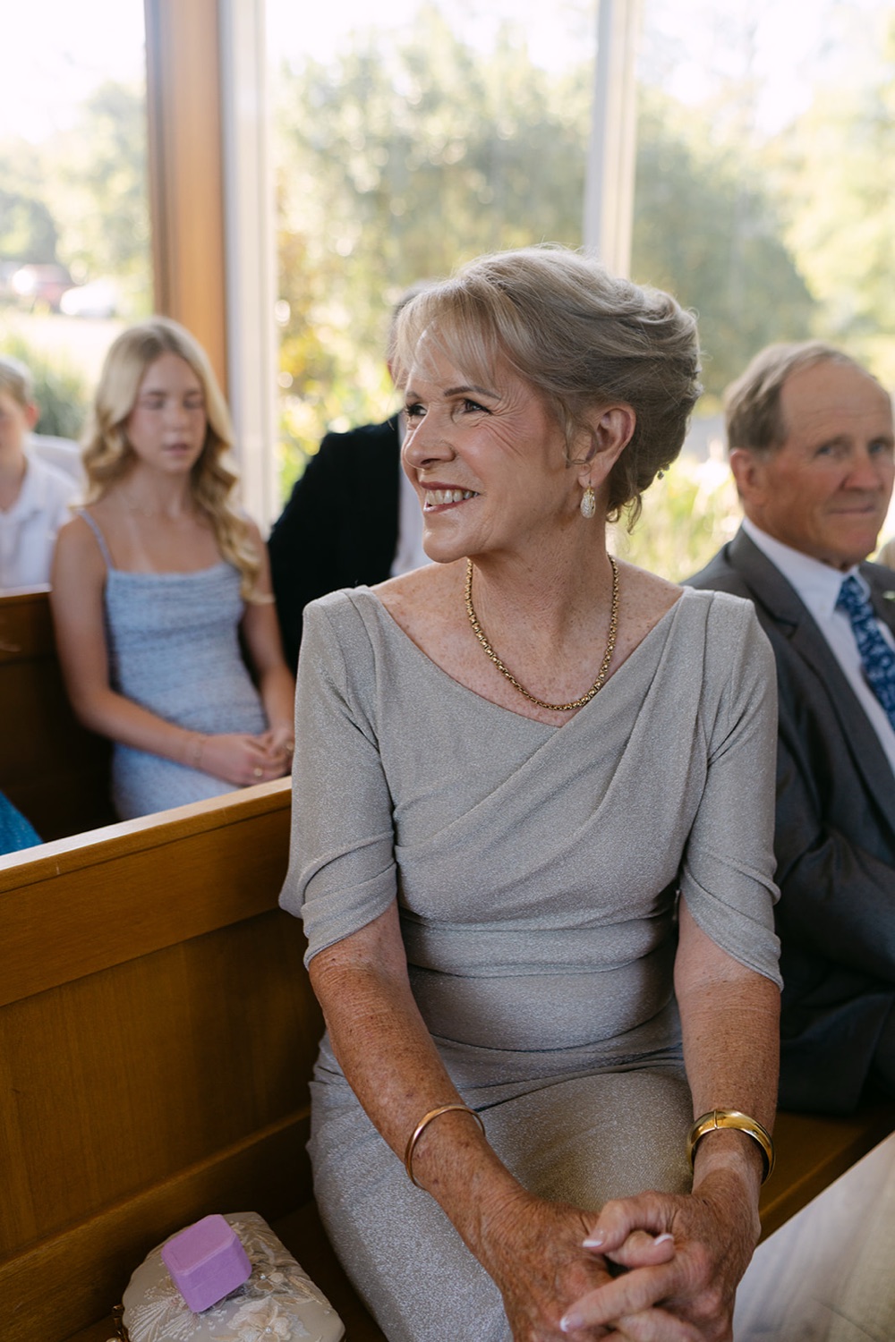 A guest during the ceremony. Jessica & Ricky's wedding at Chapel of Light, Port Stephens