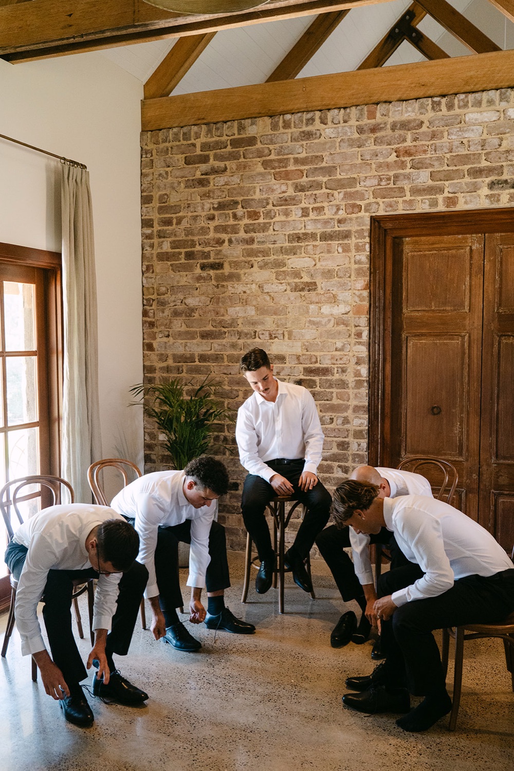 Getting ready, shoes on. Jessie & Jack's wedding at Enzo, Hunter Valley