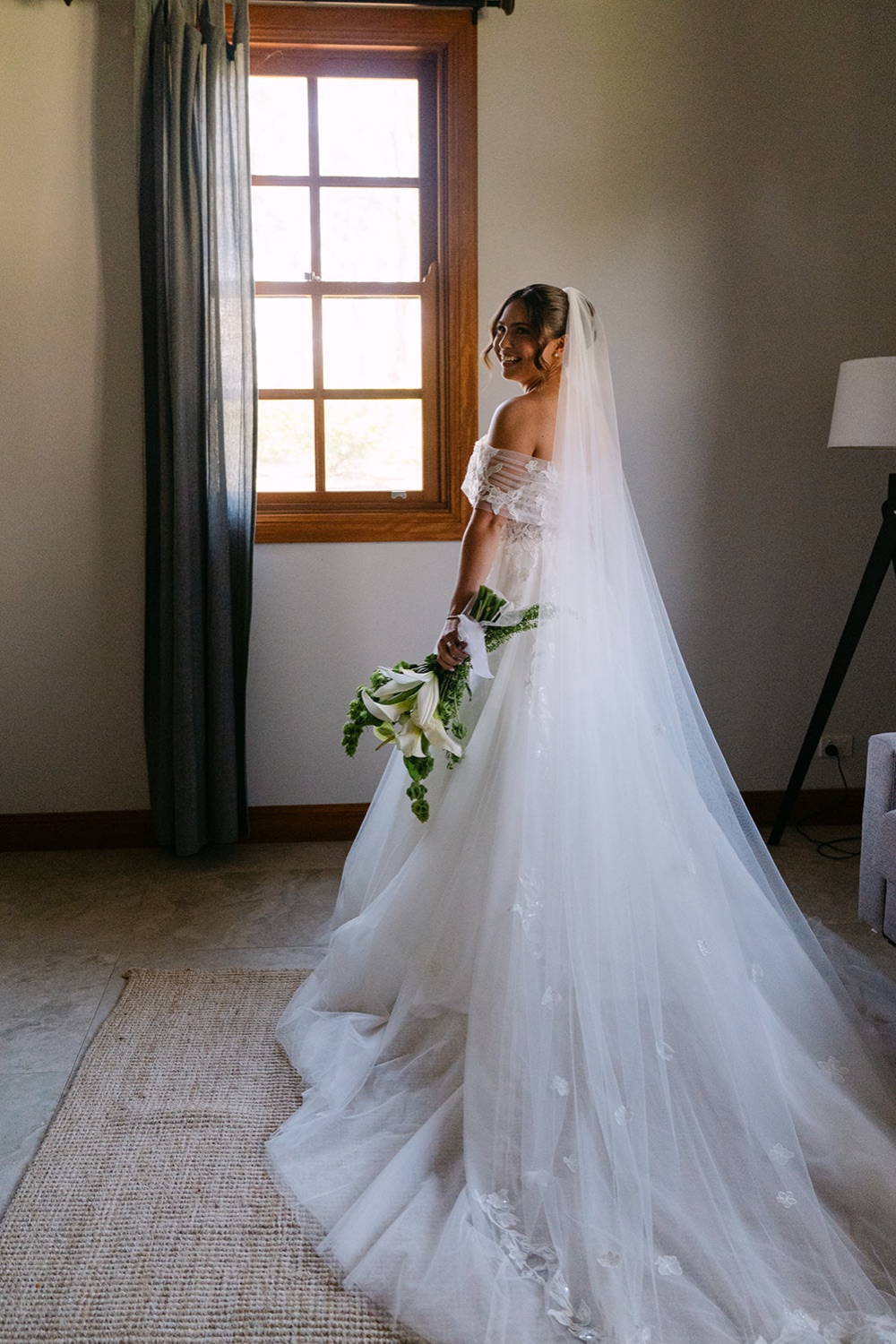 The long veil trailing behind. Jessie & Jack's wedding at Enzo, Hunter Valley