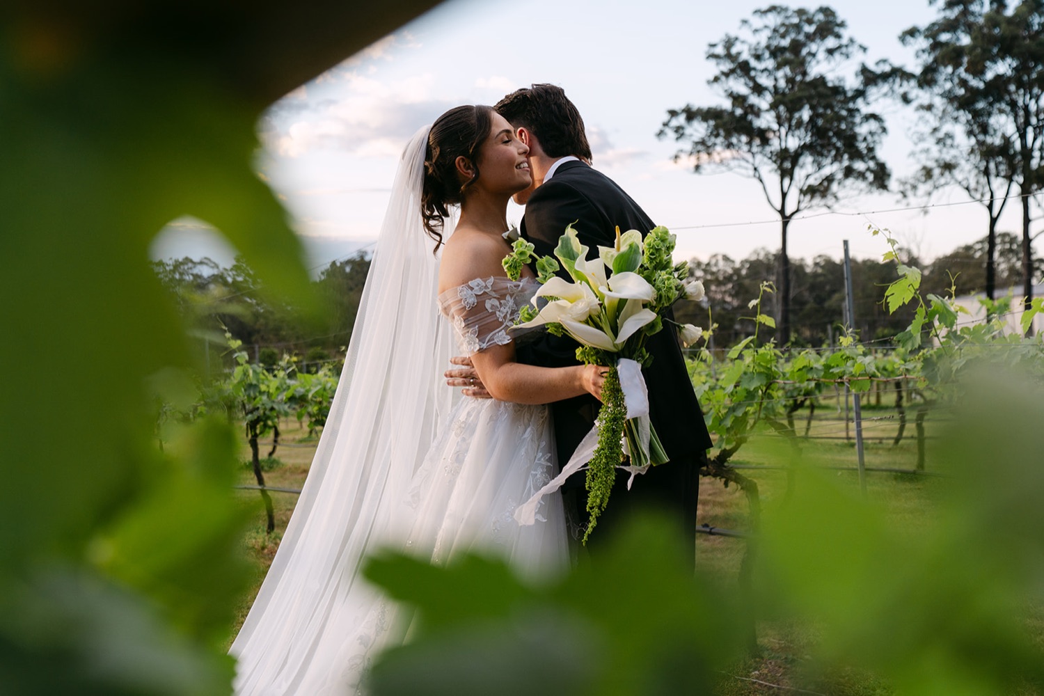 A kiss among the vines. Jessie & Jack's wedding at Enzo, Hunter Valley
