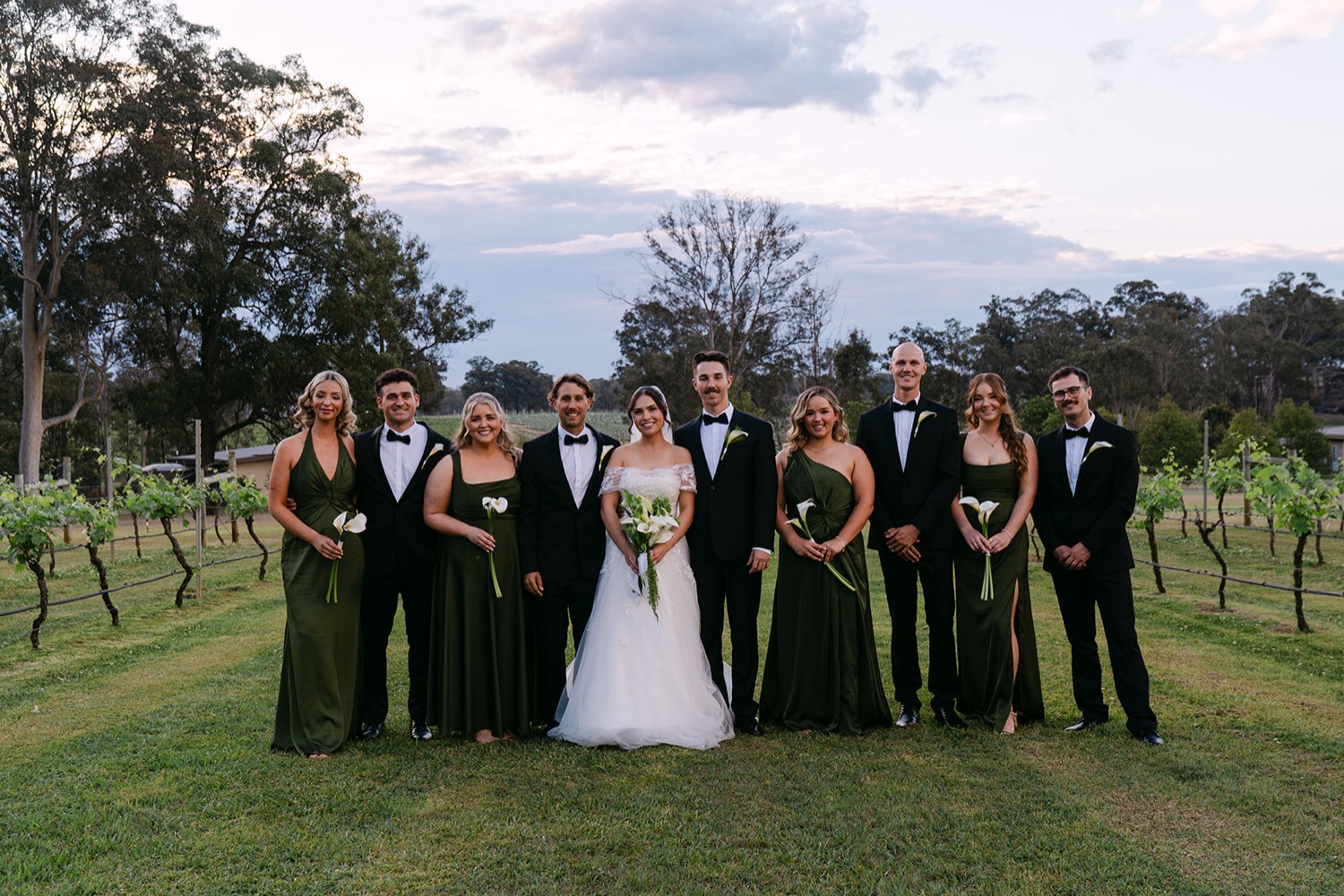 The wedding party in the vineyard. Jessie & Jack's wedding at Enzo, Hunter Valley