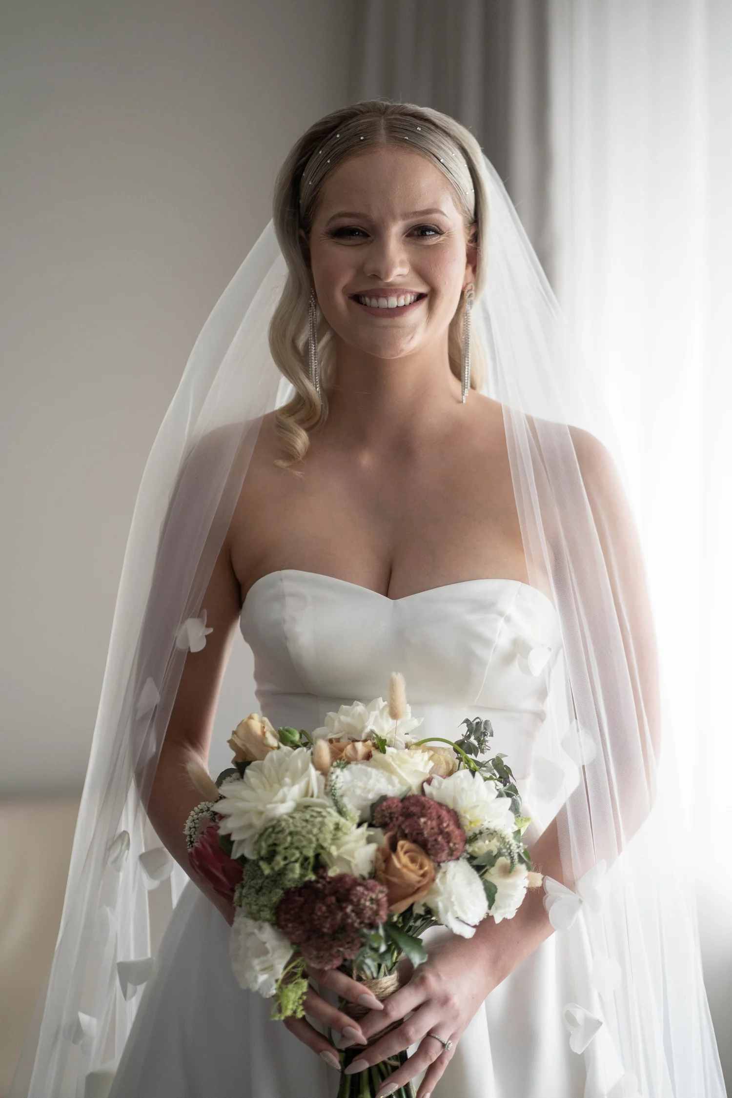 Portrait with the bouquet by the window. Jordan & Matthew's wedding at Ottimo House, Sydney