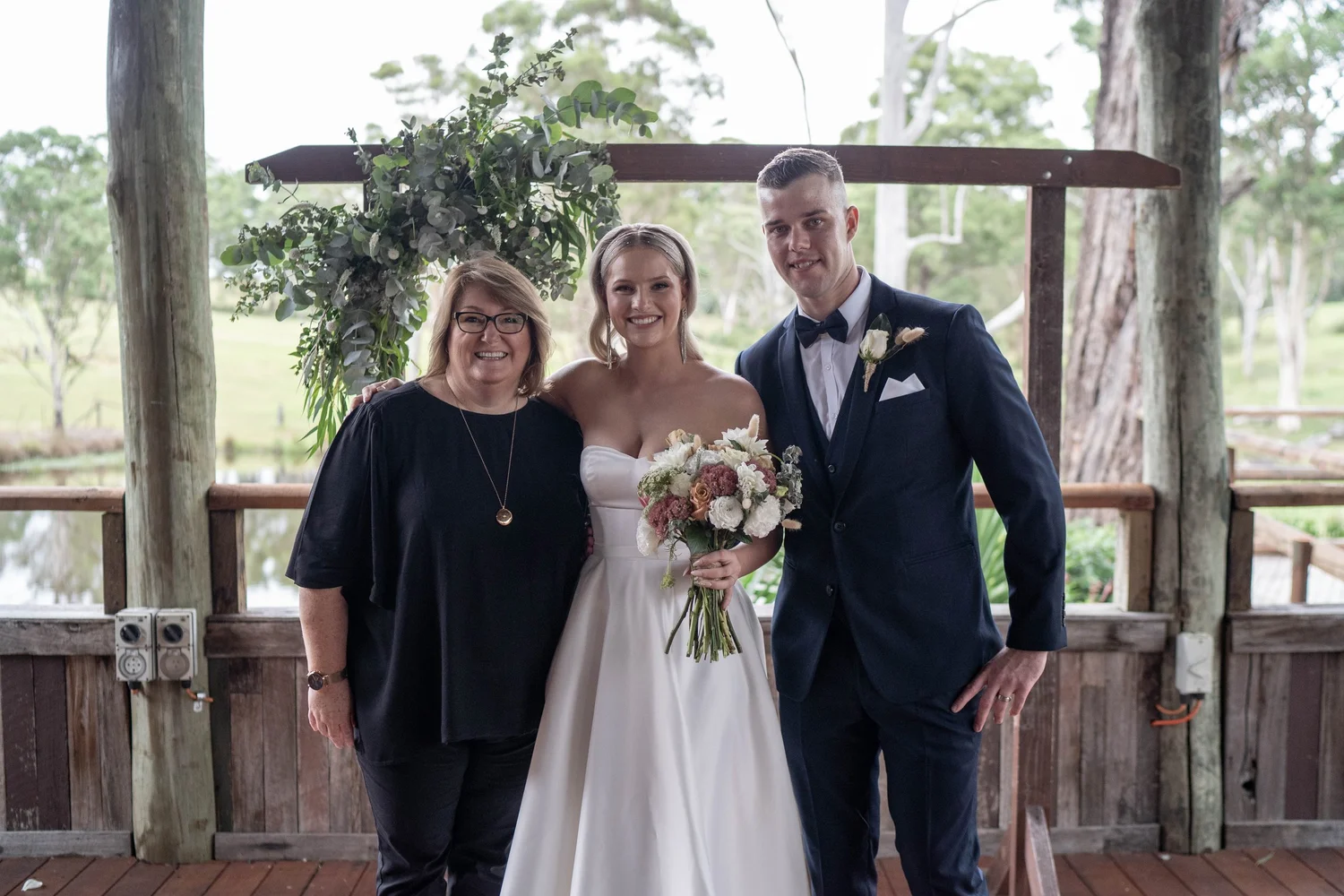 Arm in arm under the verandah. Jordan & Matthew's wedding at Ottimo House, Sydney