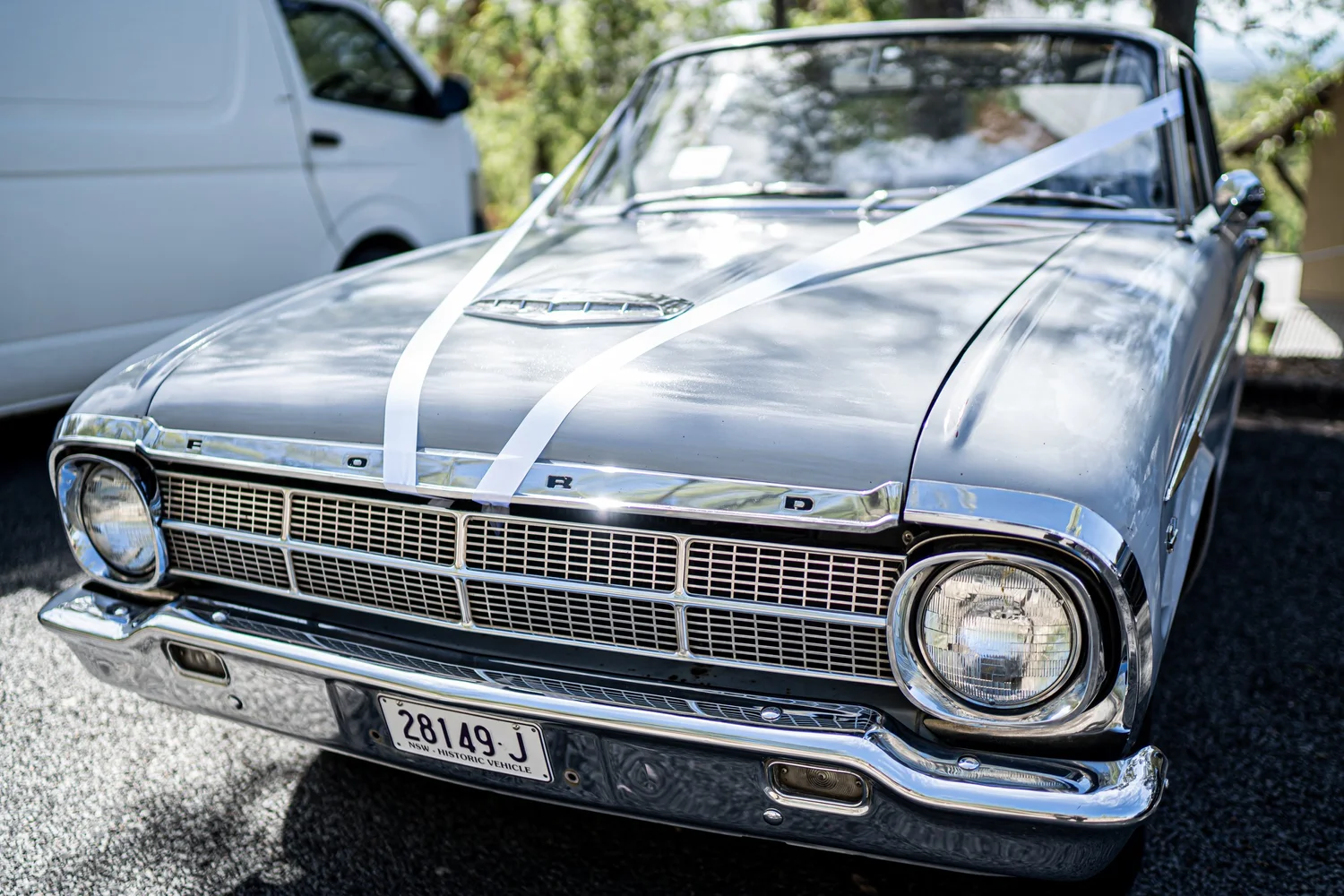 The vintage wedding car. Kaitlin & James's wedding at Oaks Cypress Lakes Resort, Hunter Valley