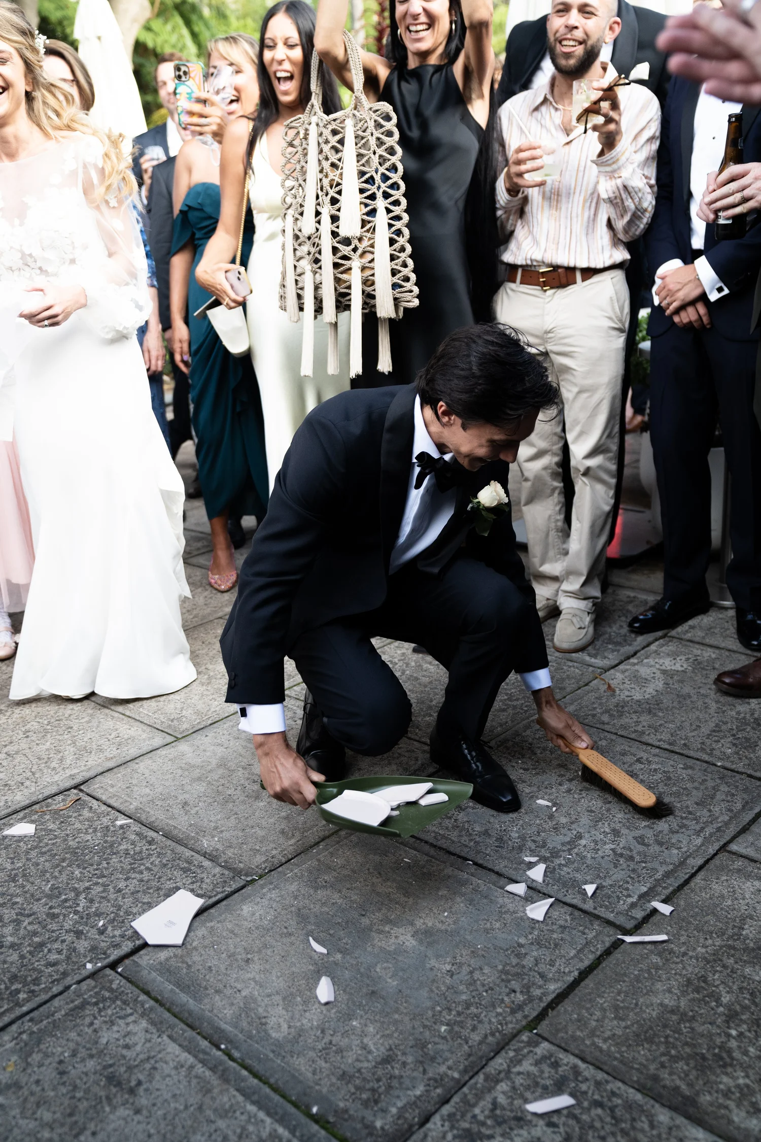 A celebration with guests in the courtyard. Kat & Aaryn's wedding at Vaucluse House, Sydney