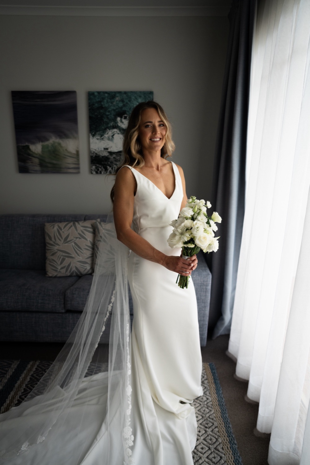 Ready by the window. Lauren & Alasdair's wedding at Shoal Bay Beach, Port Stephens