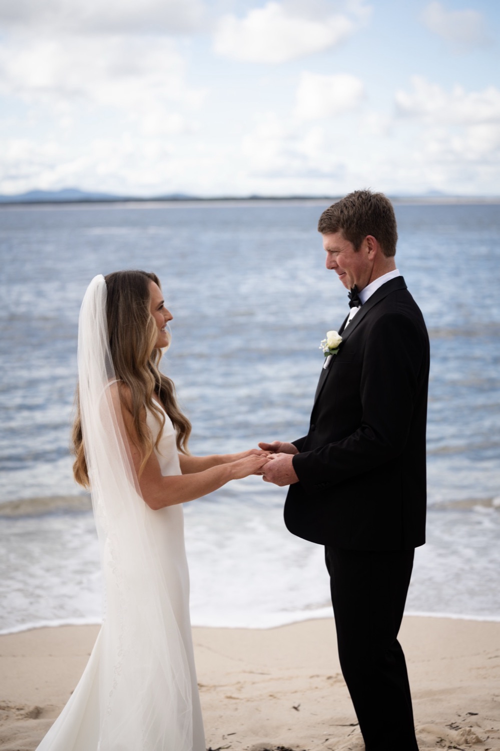 Vows at the water's edge. Lauren & Alasdair's wedding at Shoal Bay Beach, Port Stephens
