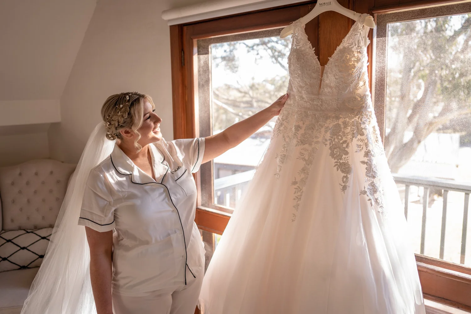 Family with the wedding dress. Lauren & Matt's wedding at Wandin Estate, Hunter Valley