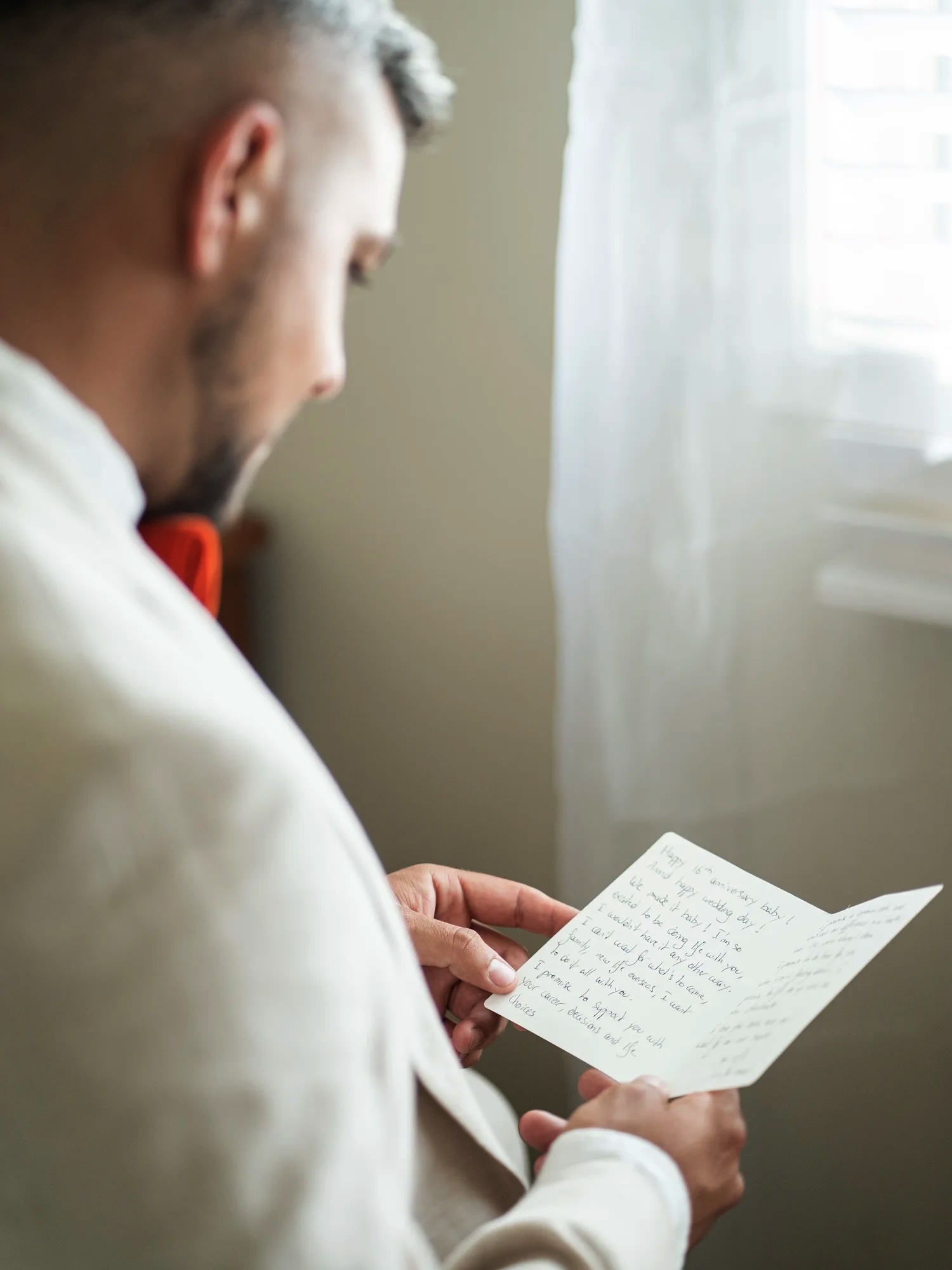 Reading a letter before the ceremony. Naz & Nadeem's wedding at Palmers Lane on Vineyard, Hunter Valley
