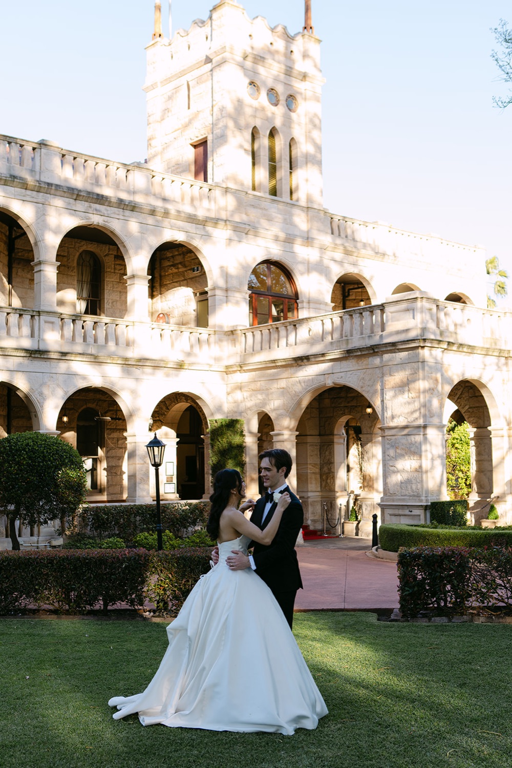 The couple in front of Curzon Hall. Phoebe & Cameron's wedding at Curzon Hall, Sydney
