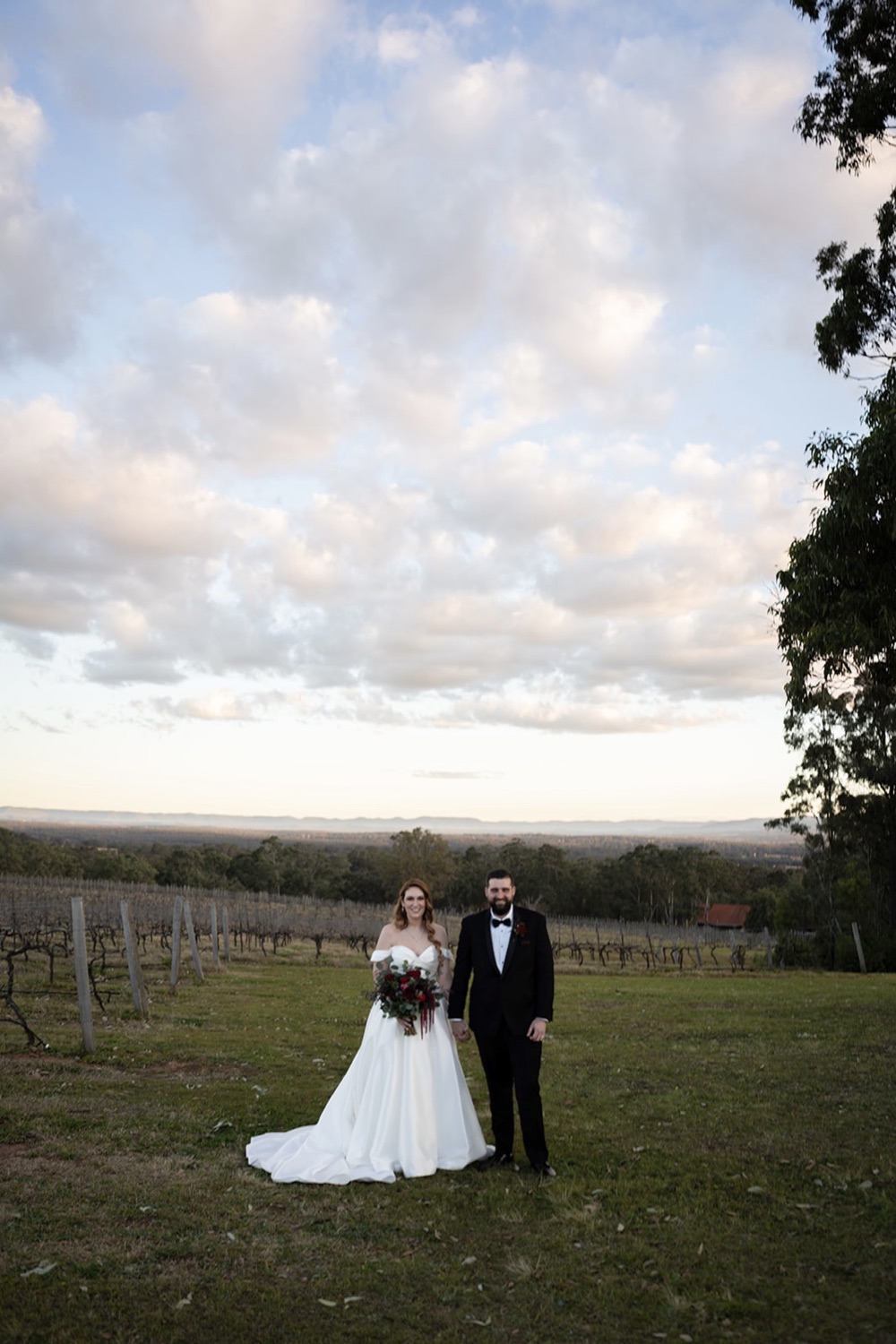 The couple under a big sky. Sarah & Alex's wedding at Wandin Estate, Hunter Valley