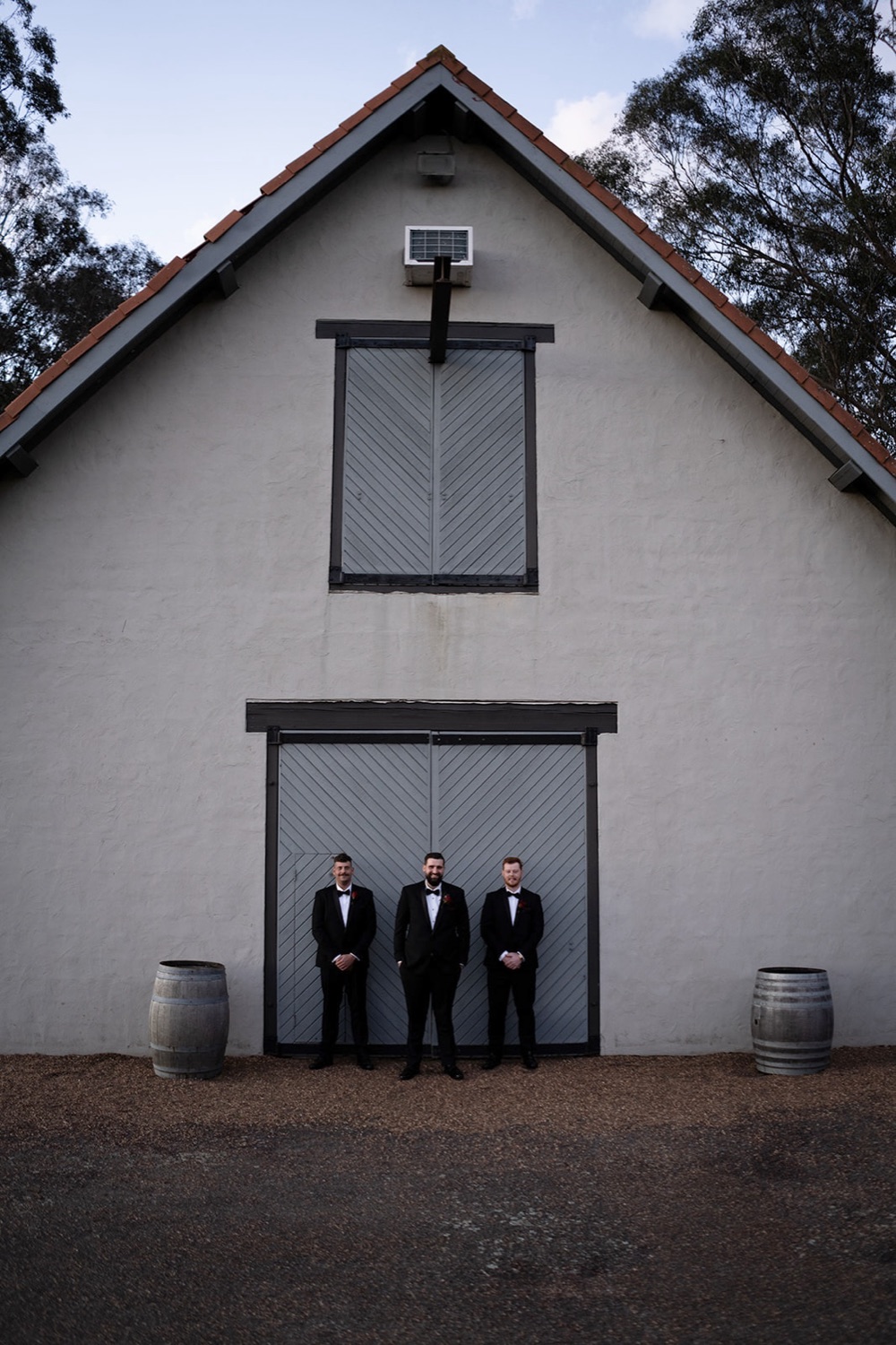 The wedding party at the barn doors. Sarah & Alex's wedding at Wandin Estate, Hunter Valley