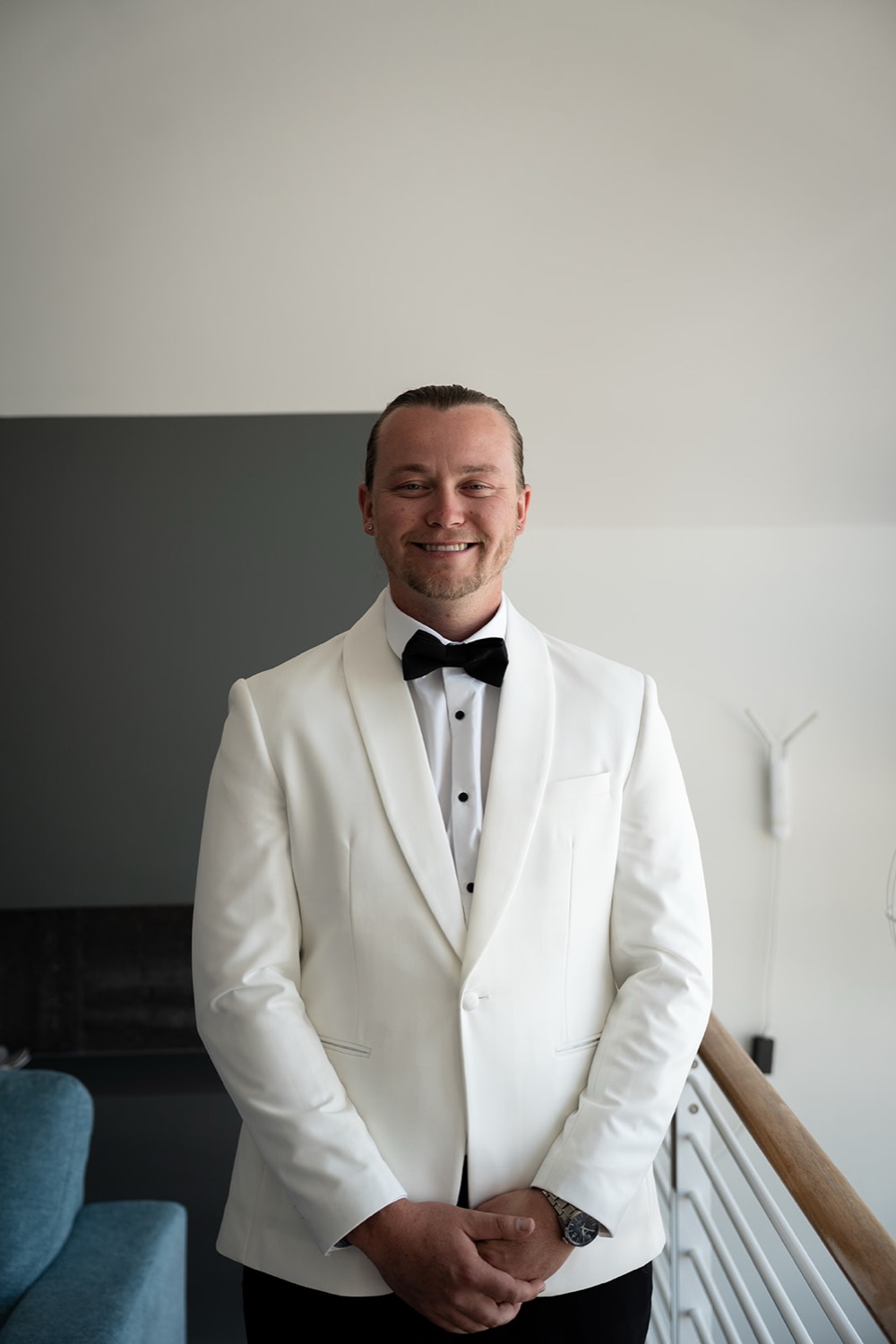 Ready in a white dinner jacket. Sophie & Benjamin's wedding at Caves Coastal Bar & Bungalows, Newcastle