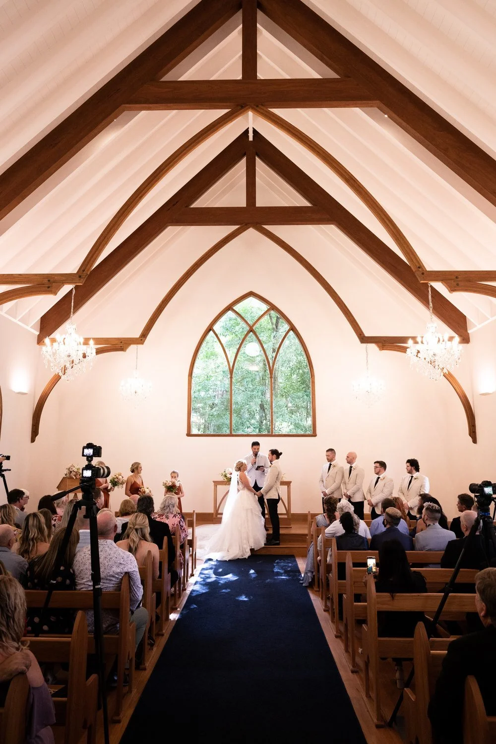 Inside the chapel during the ceremony. Tamara & Sam's wedding at Kantara House, Central Coast