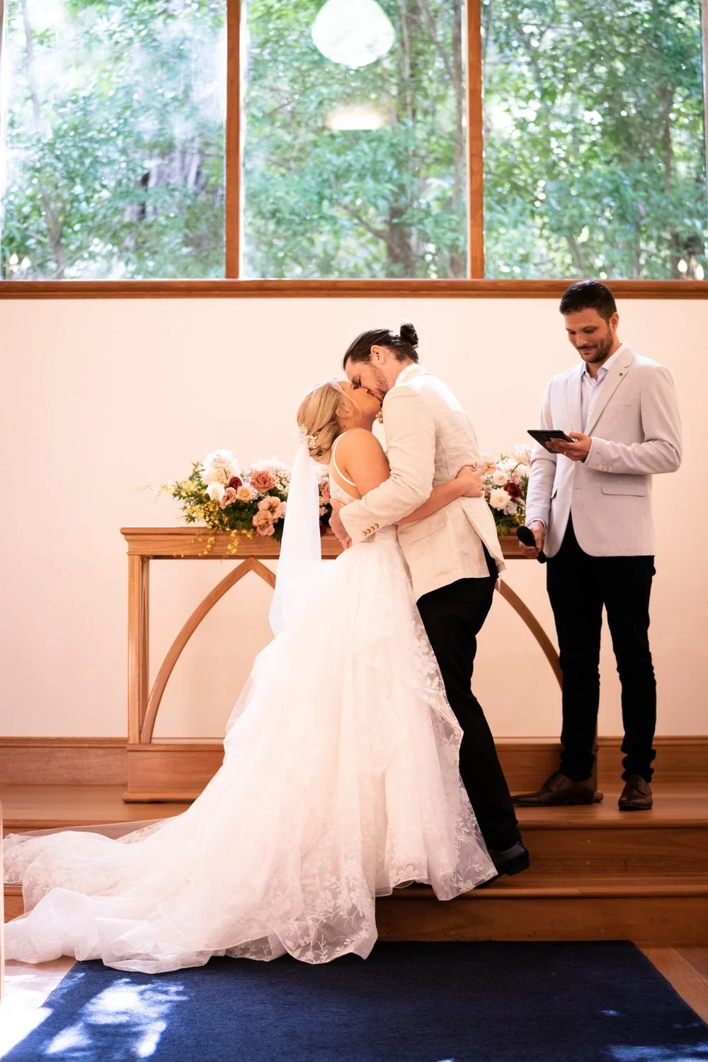 Vows at the chapel altar. Tamara & Sam's wedding at Kantara House, Central Coast