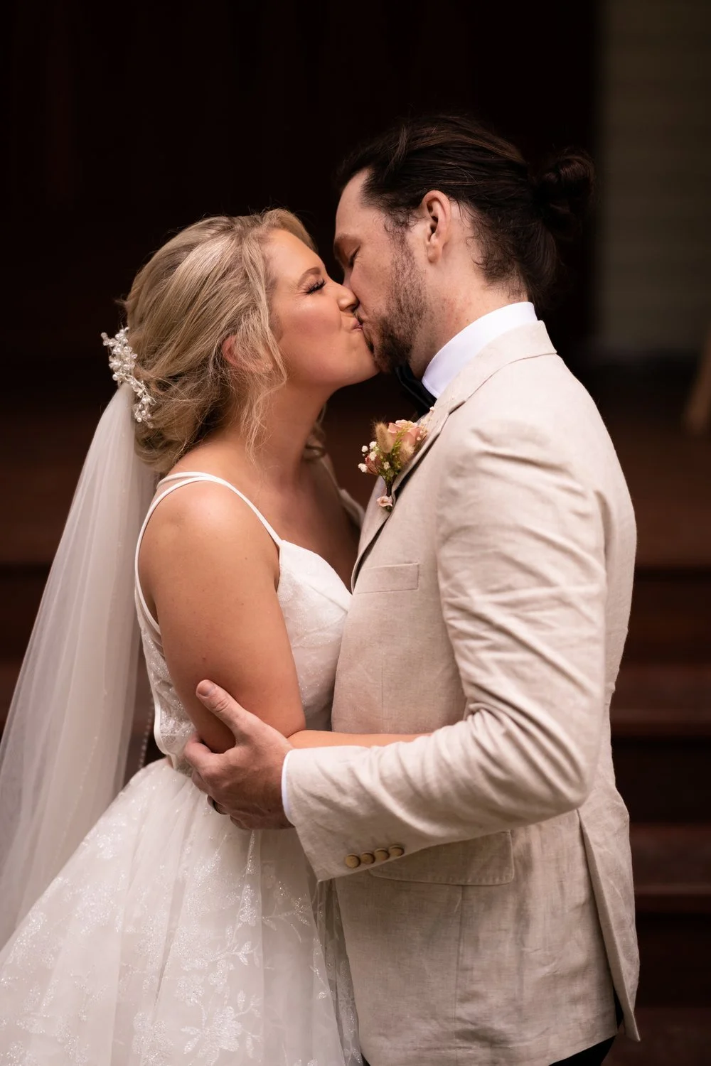 A kiss in the garden. Tamara & Sam's wedding at Kantara House, Central Coast