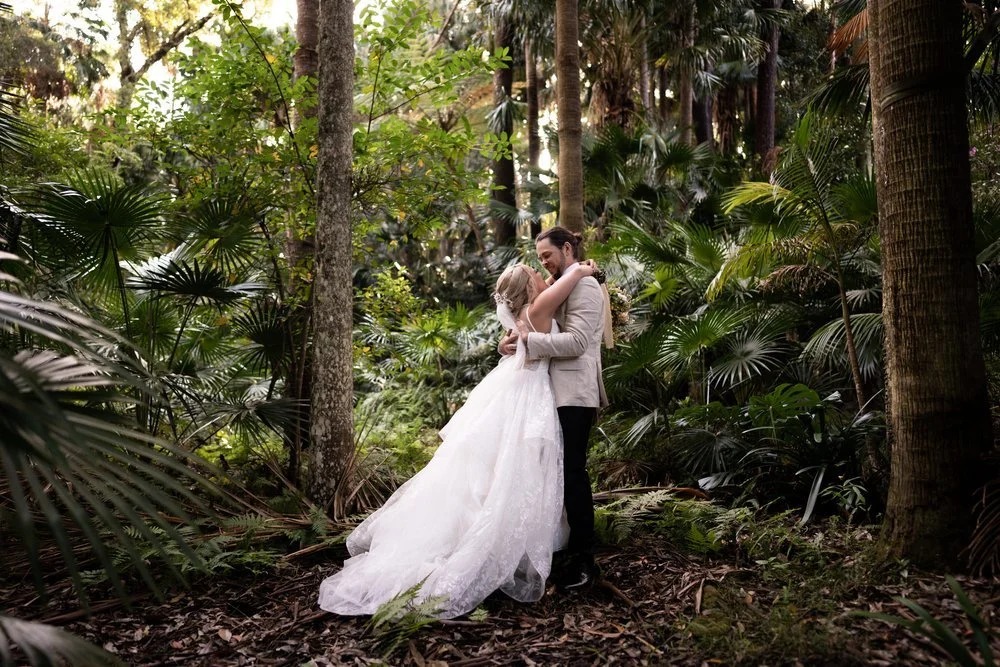 The couple in the rainforest garden. Tamara & Sam's wedding at Kantara House, Central Coast